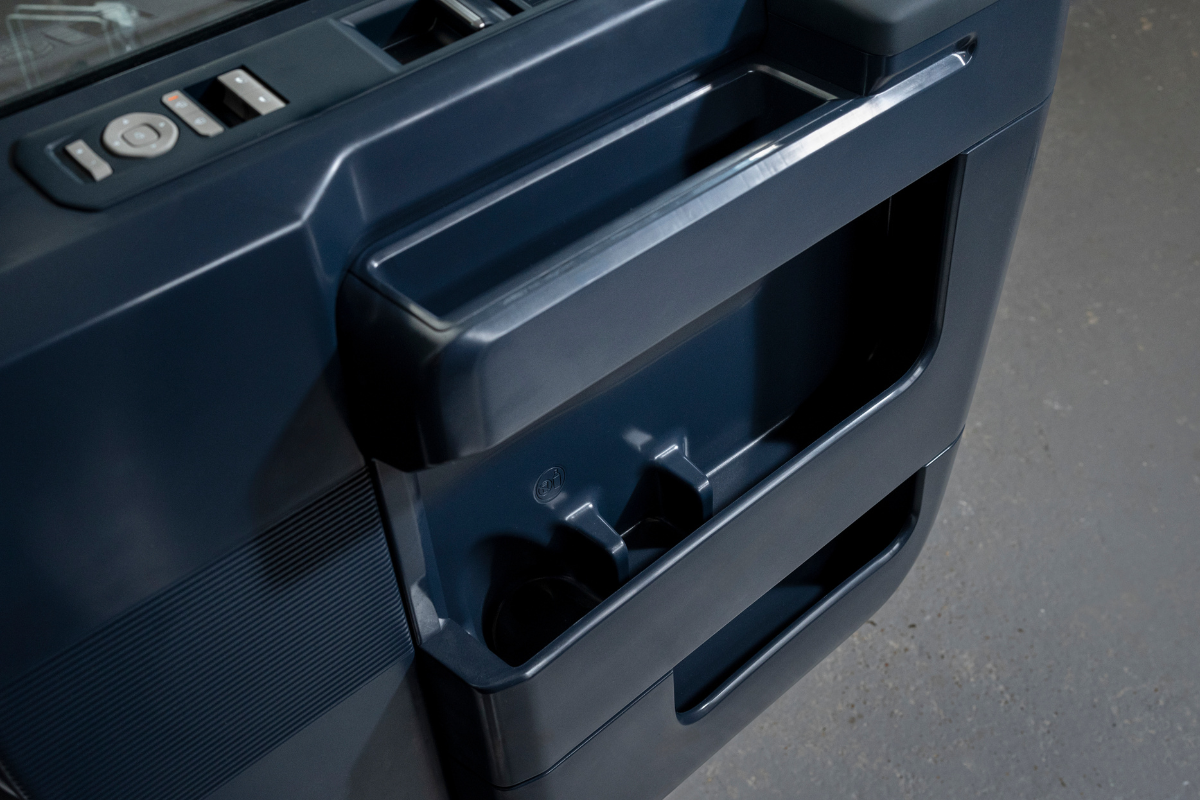 Lagringsplass og oppbevaringsrom i sidedør på Kia PV5 varebil