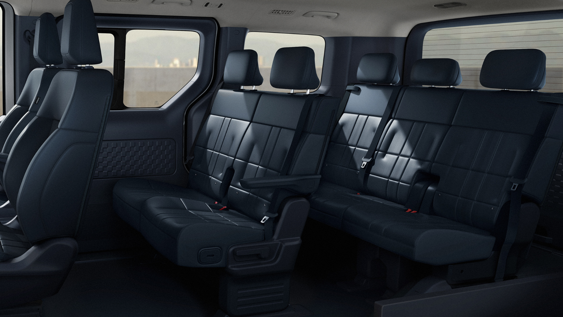 Kia PV5 7-seter interiør med skinnseter og 4 isofix
