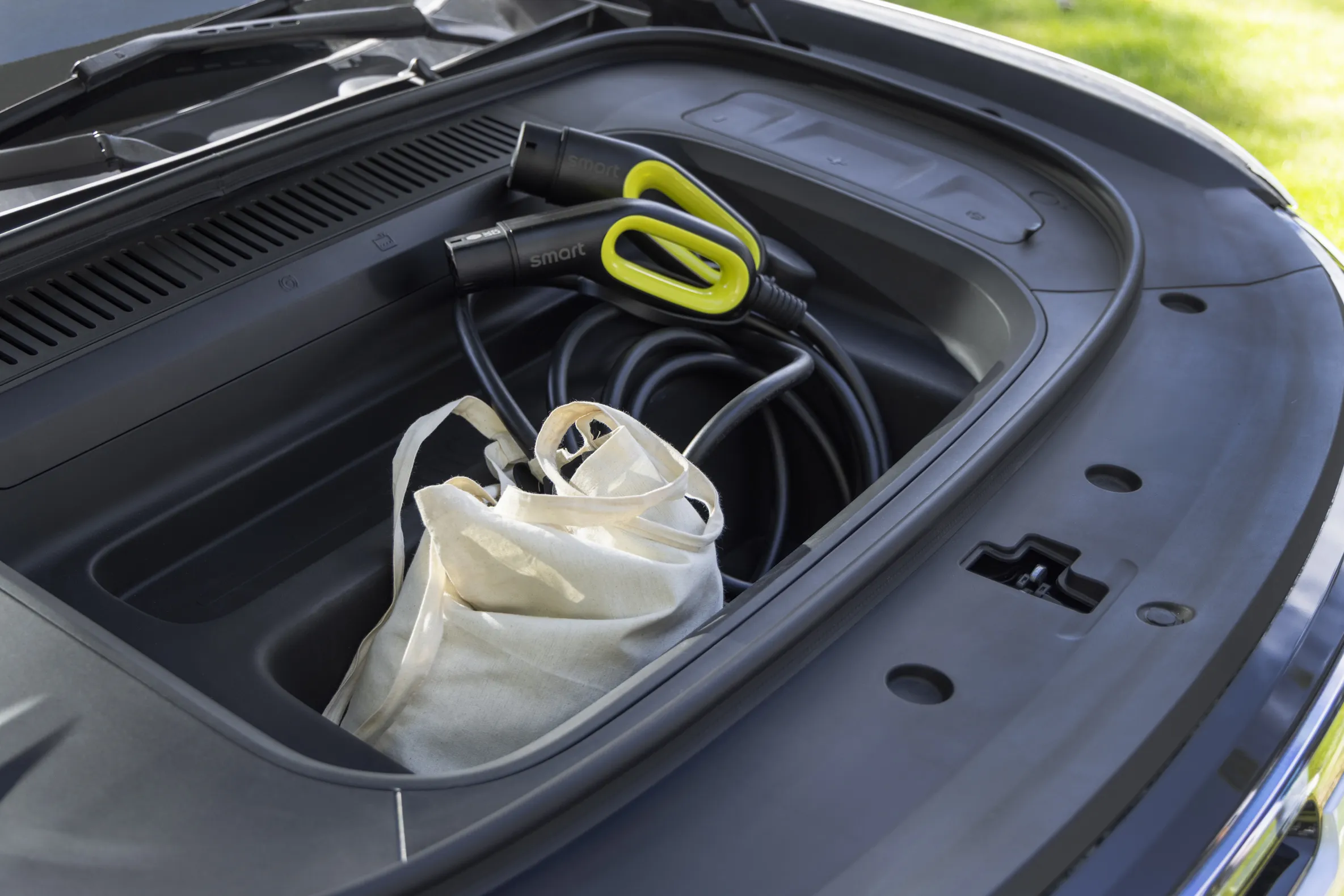 Frunken i smart #5 med ladekabel og handlepose