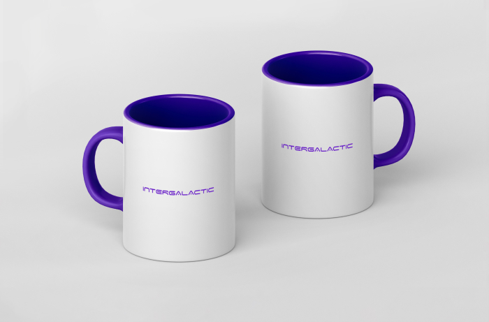 Two white mugs with a purple handle