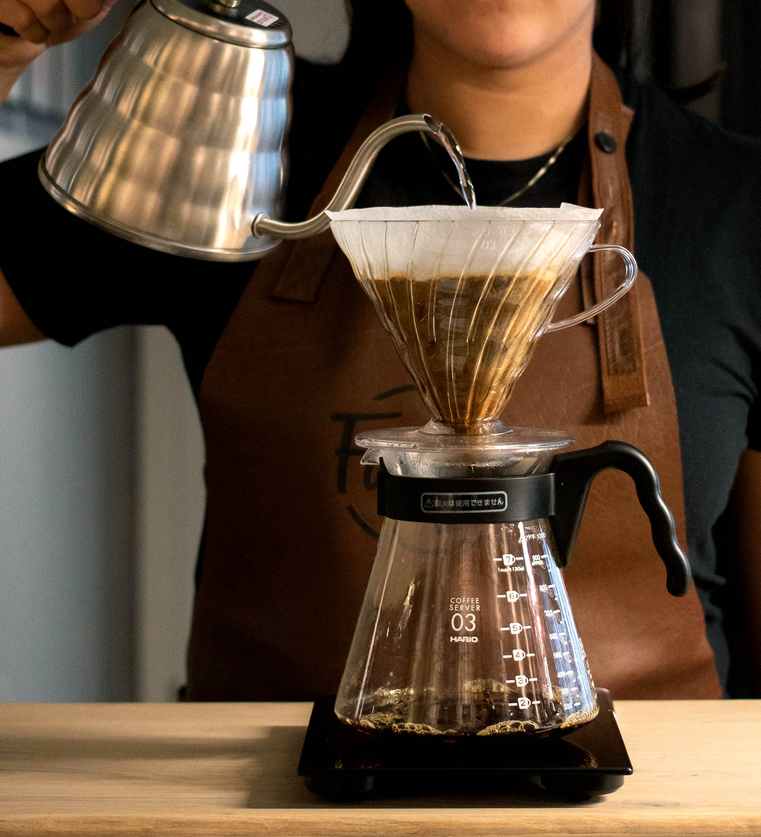 Woman making hand brew