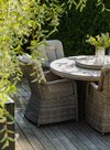 Lindholm behagelig spisestol i naturfarget rotting.