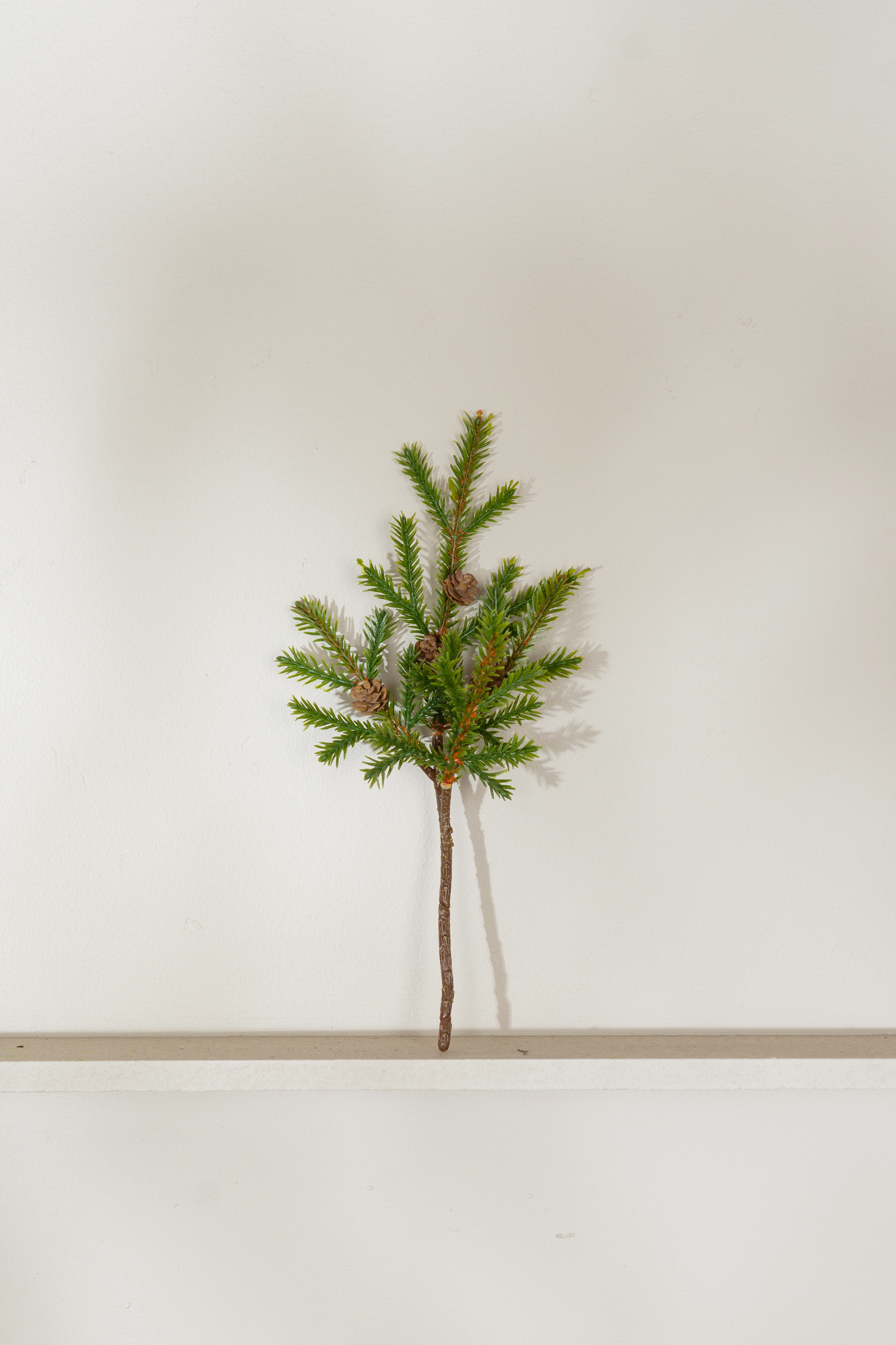 Kunstig grankvist 22 cm