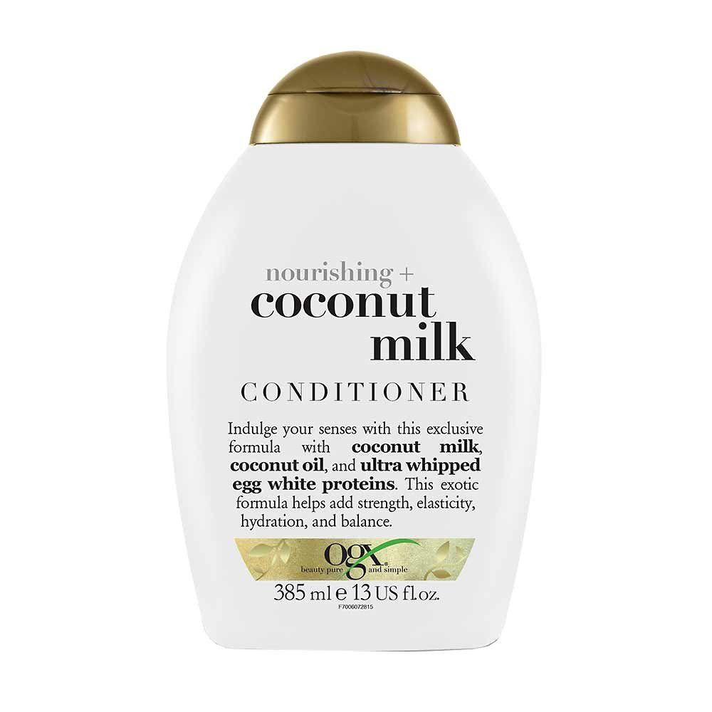 Bilde av en flaske med OGX Coconut Milk Balsam 385 ml