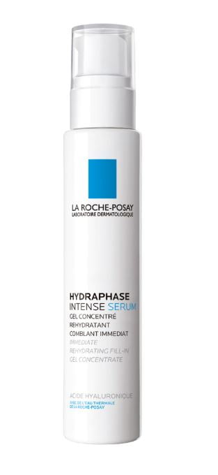 Et produktbilde av La Roche-Posay Hydraphase Intense Serum, en fuktighetsgivende gel med hyaluronsyre. Flasken er hvit med et gjennomsiktig lokk, og produktnavnet er trykt i sort og blått på forsiden. Kremen er beregnet på umiddelbar rehydrering av huden