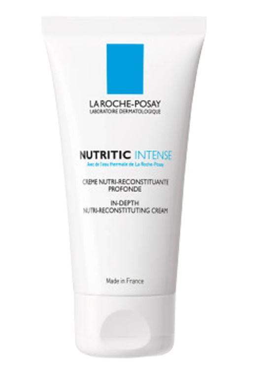 Et produktbilde av La Roche-Posay Nutritic Intense, en dypt nærende krem for tørr hud. Tuben er hvit med blå og svart tekst og har en gjennomsiktig hette. Produktet er parabenfritt og er laget i Frankrike.