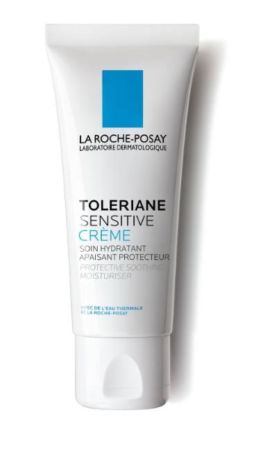 Et produktbilde av La Roche-Posay Toleriane Sensitive Crème, en fuktighetsgivende og beskyttende krem for sensitiv hud. Tuben er hvit med blå logo og svart tekst, og inneholder termalvann fra La Roche-Posay for å berolige og beskytte huden