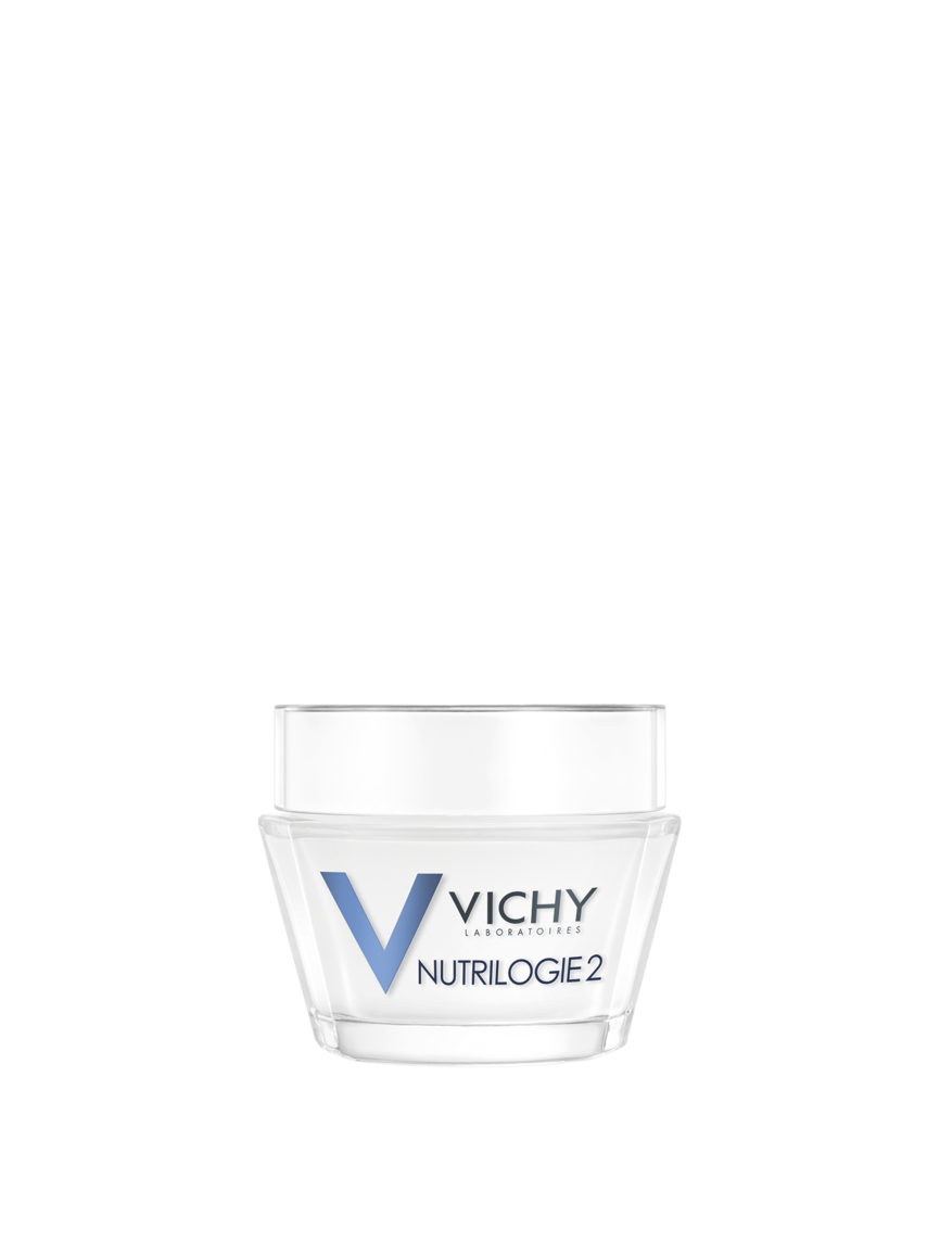 Et produktbilde av Vichy Nutrilogie 2, en ansiktskrem fra Vichy Laboratoires. Kremen kommer i en gjennomsiktig krukke med hvitt lokk og har en etikett med Vichy-logoen og produktnavnet 'Nutrilogie 2' på forsiden.