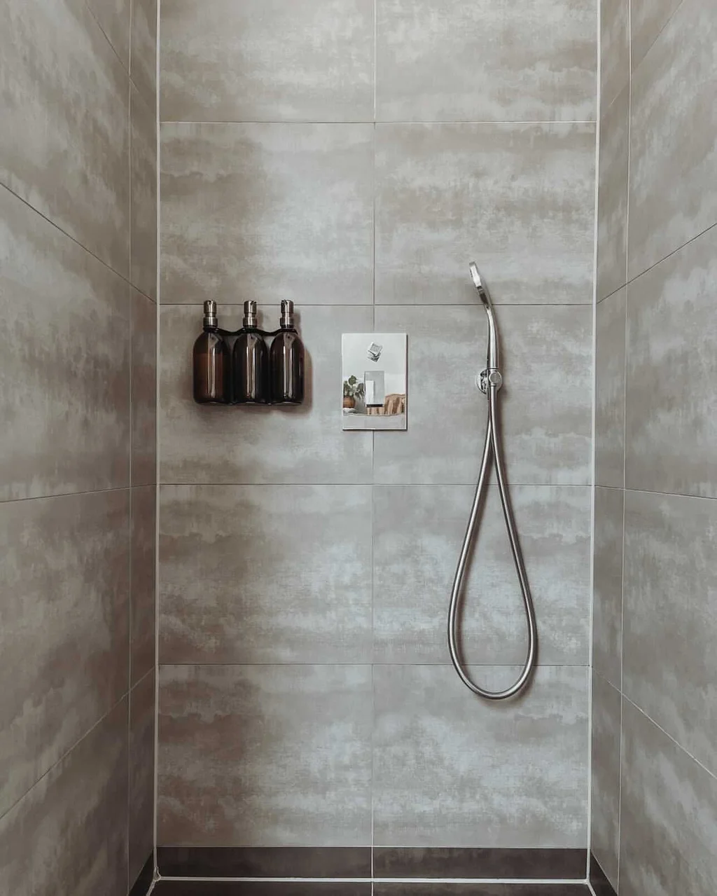 wall mounted soap dispenser in shower