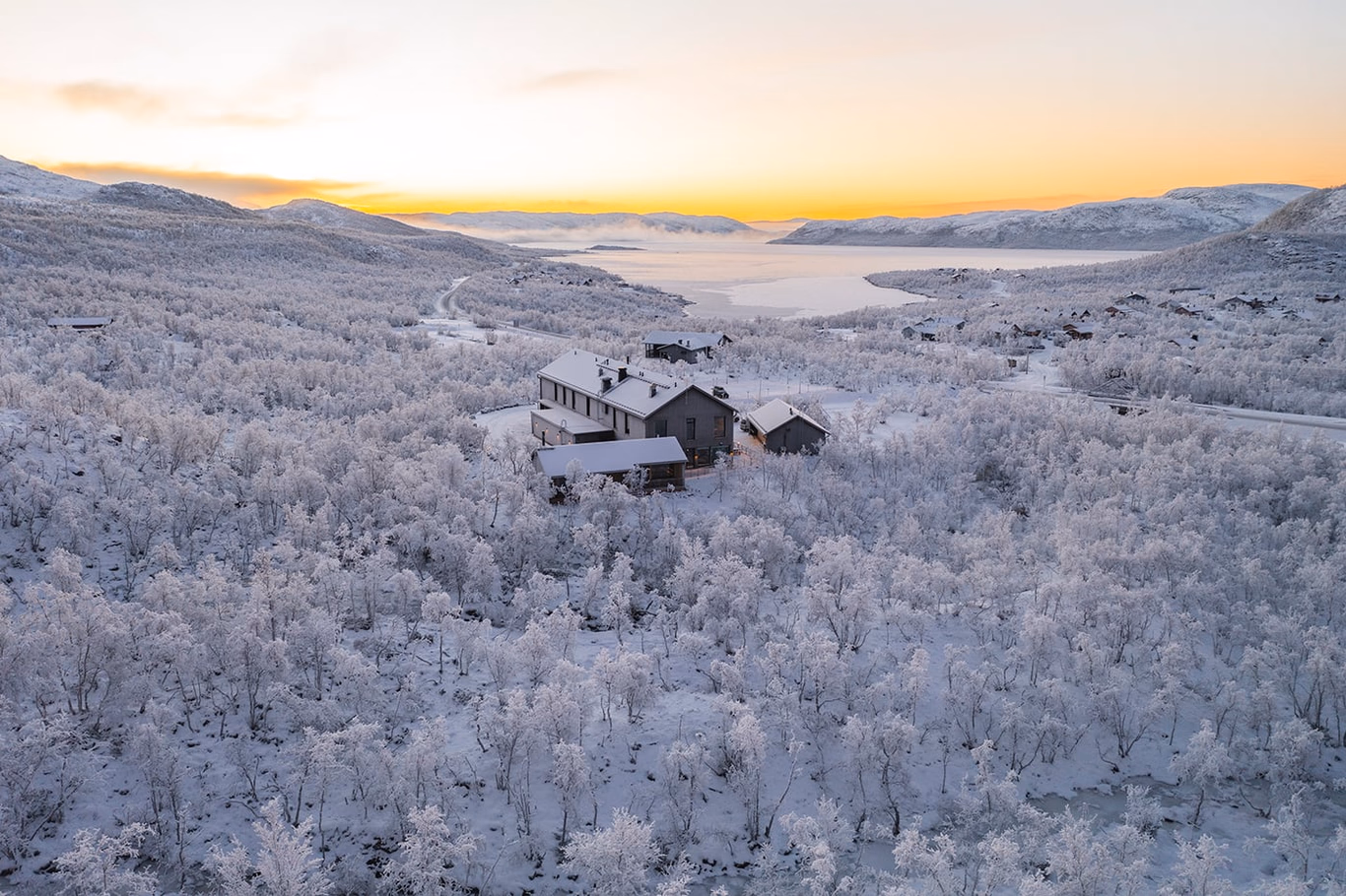 Cahkal Hotel in a snowy fell landscape, Kilpisjärvi