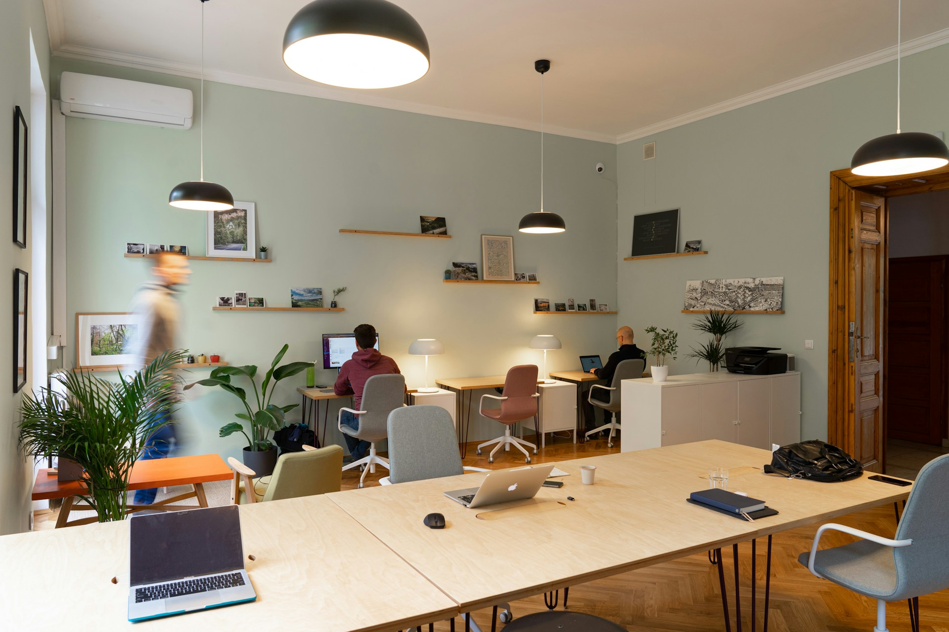 People in smaller office working 