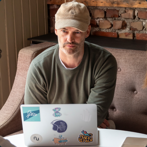 Focused founder working on a laptop