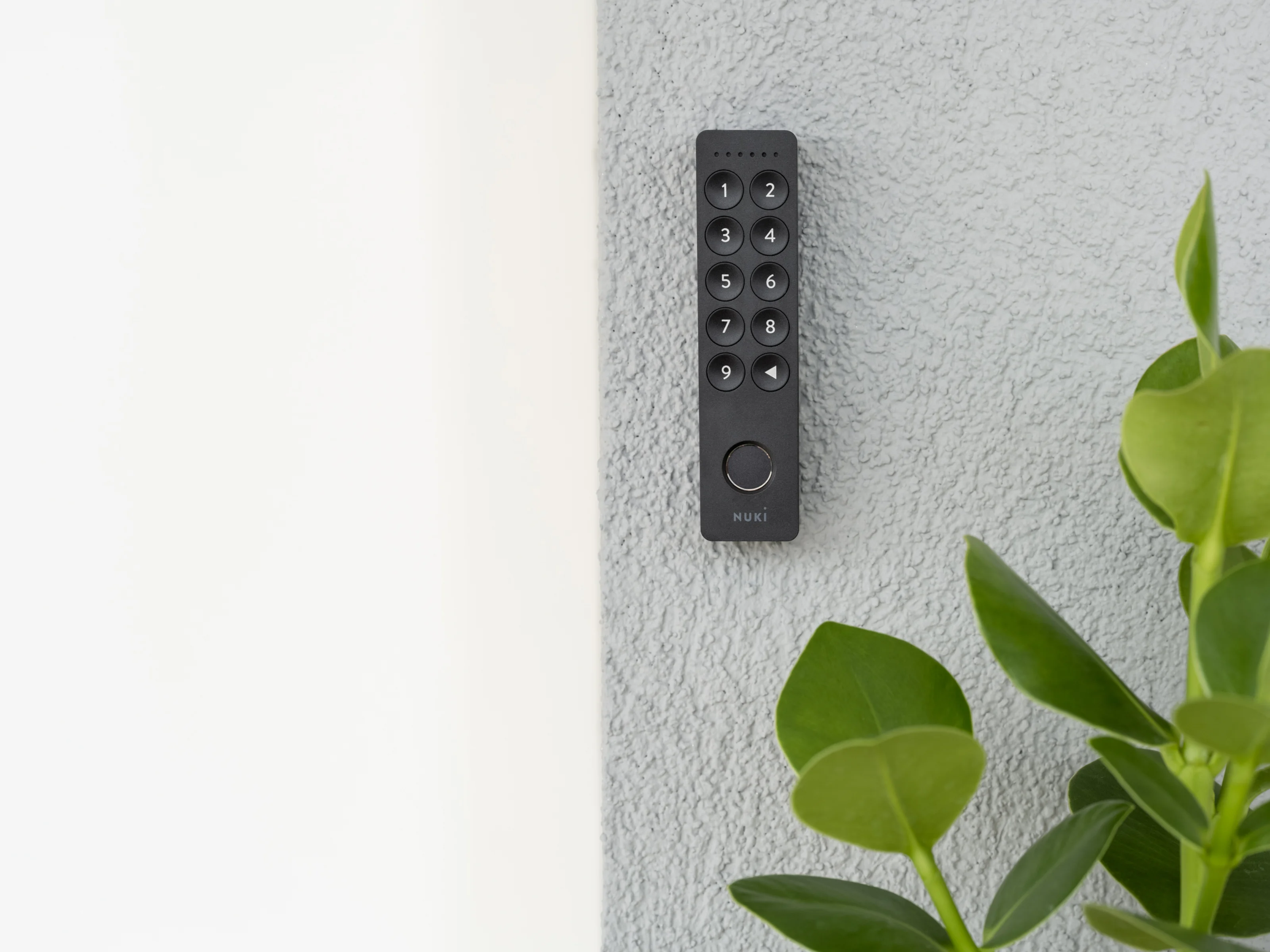 Nuki Keypad 2 mounted on an exterior wall for secure, keyless access.