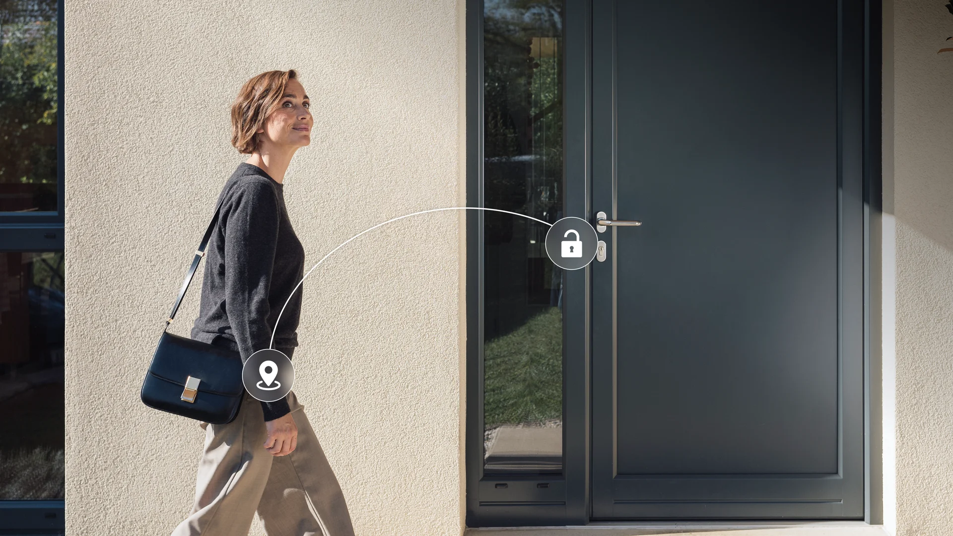 Woman approaching her front door – Nuki Auto Unlock detects her and unlocks the door automatically.