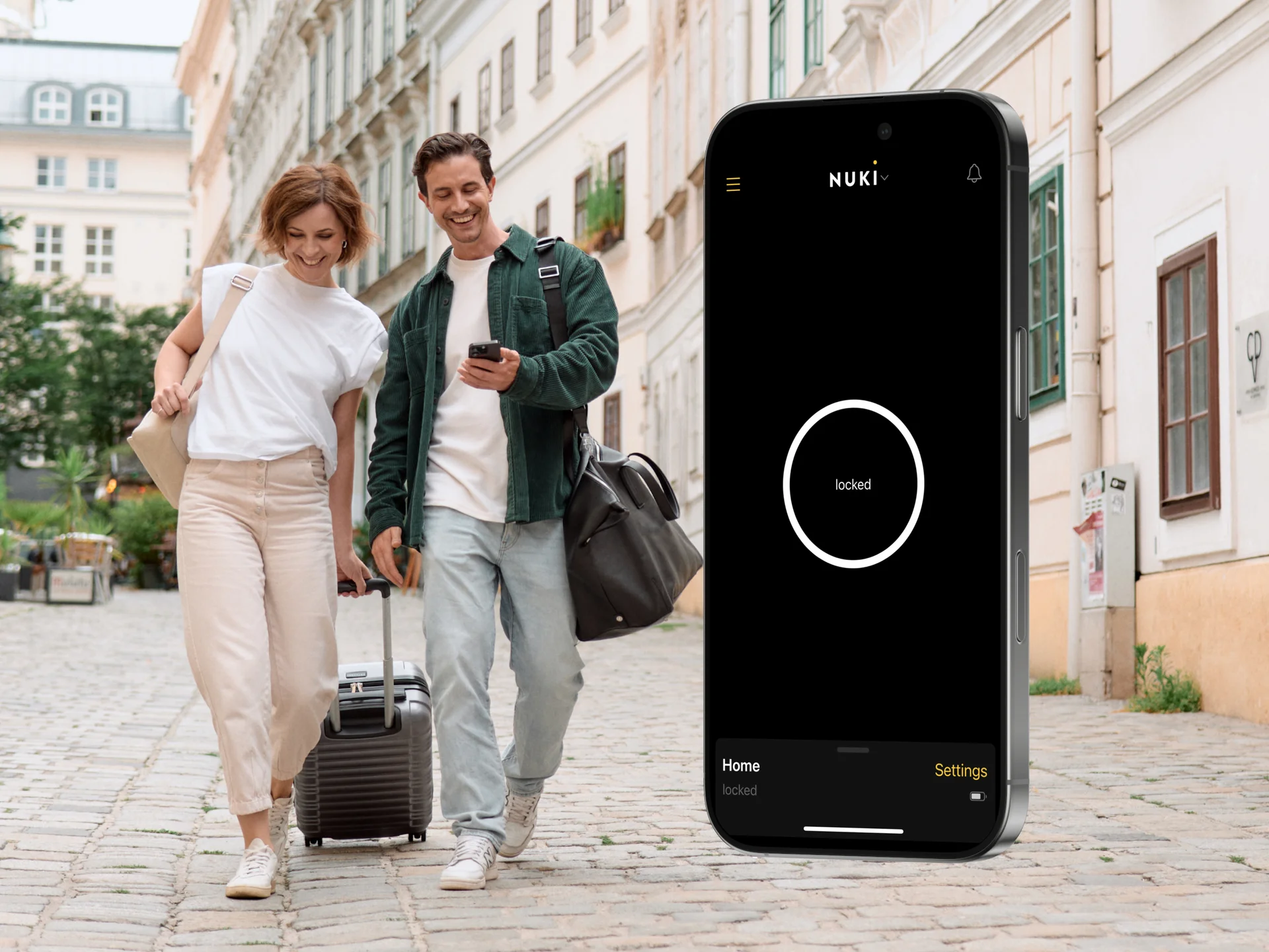 Couple with luggage walks outside; Nuki app shows door locked.
