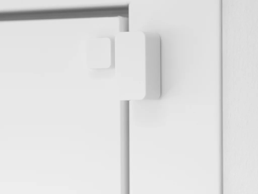 Nuki Door Sensor mounted on a white door