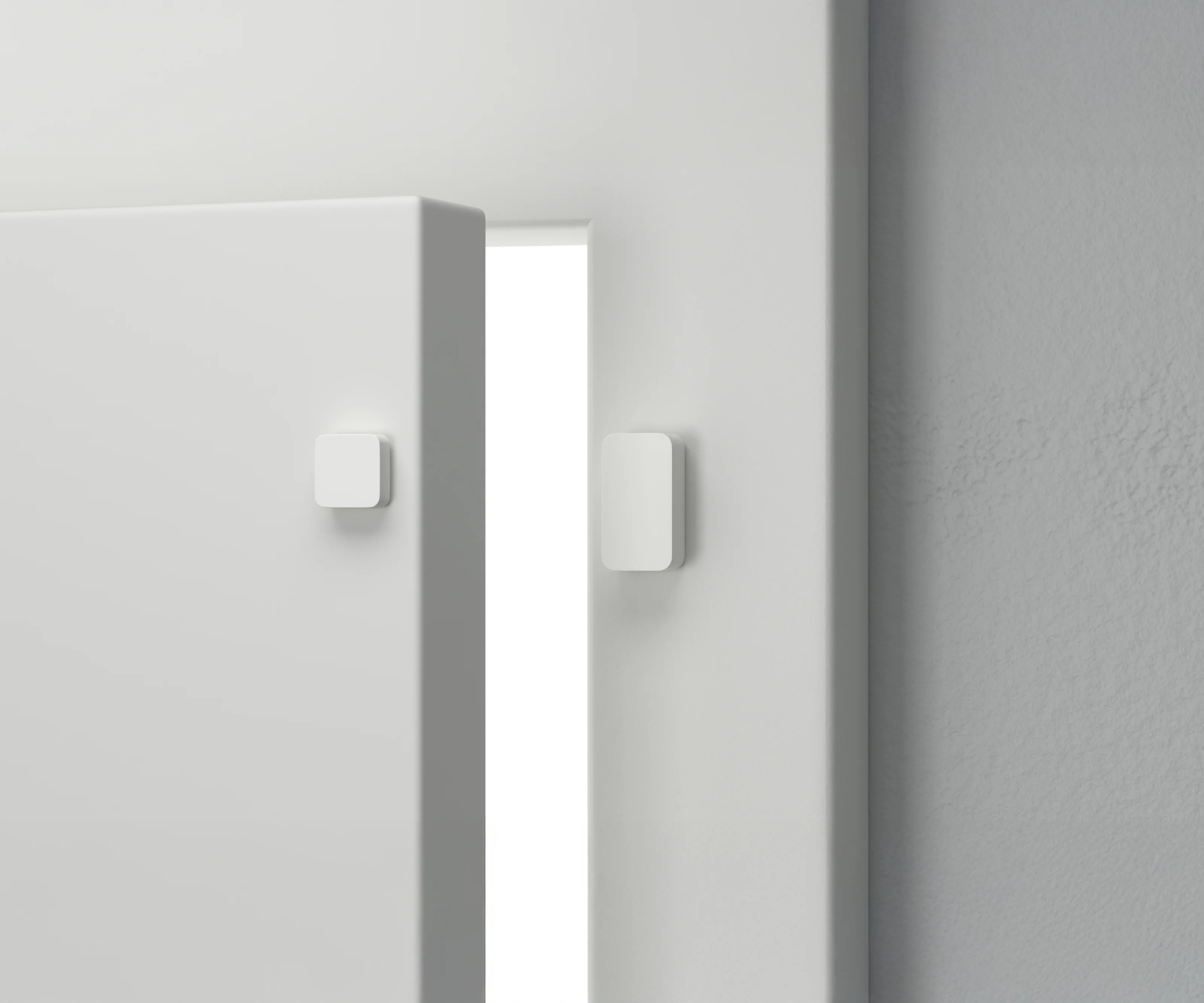 The Nuki Door Sensor mounted on a white door.