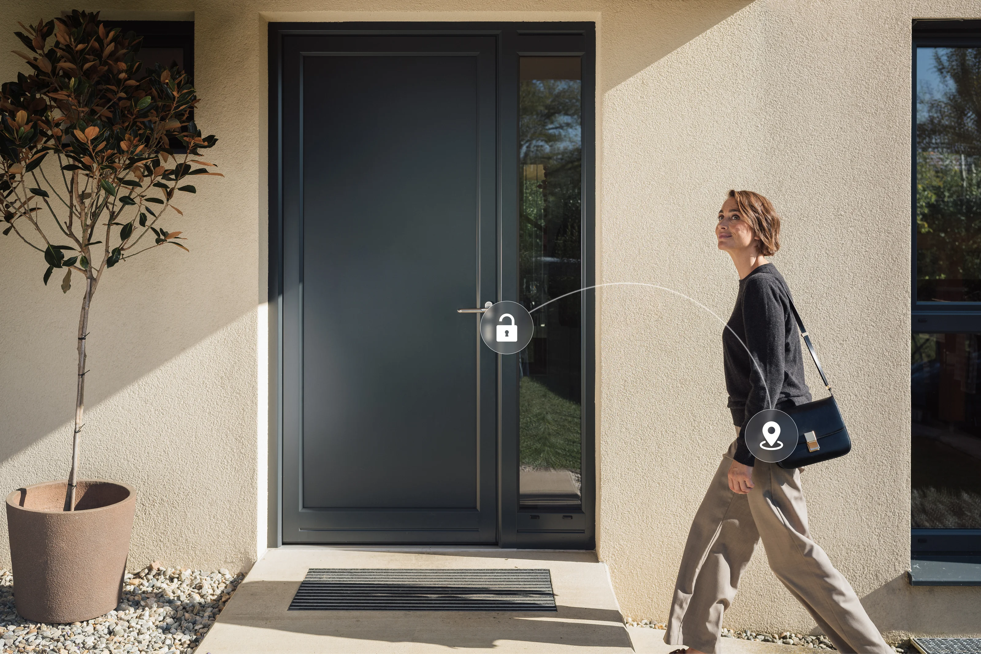 Woman approaching her front door, which unlocks automatically via smart geofencing feature