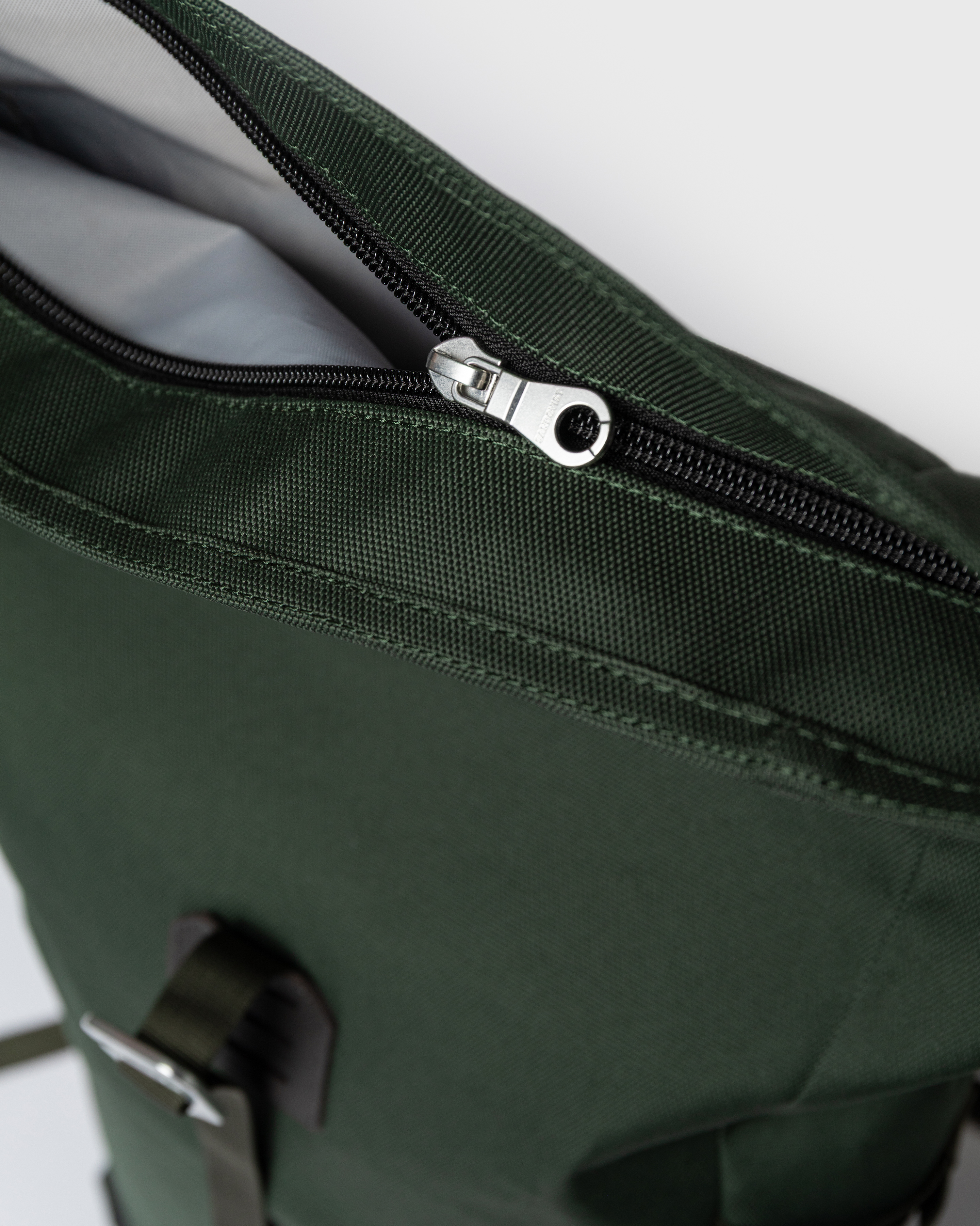 Zipper closure for main compartment on Sandqvist backpack ICON Rolltop Backpack M in Dark Green