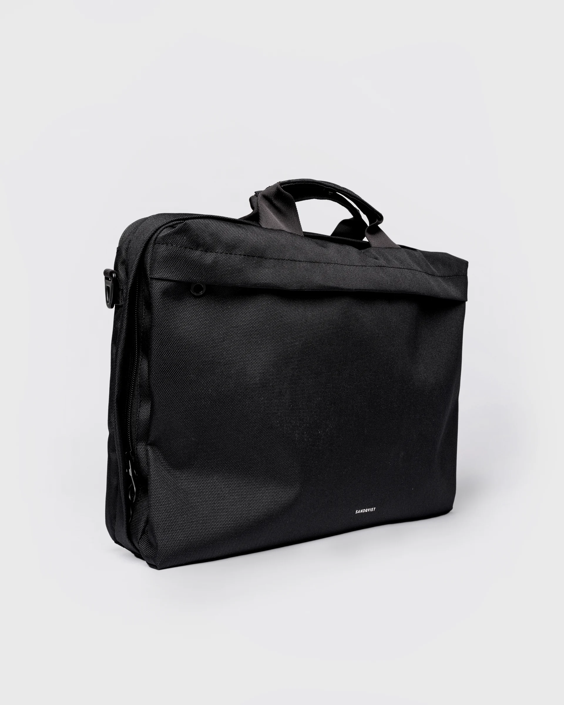 GO Briefcase, black. Front view, two handles and front pocket with zipper.