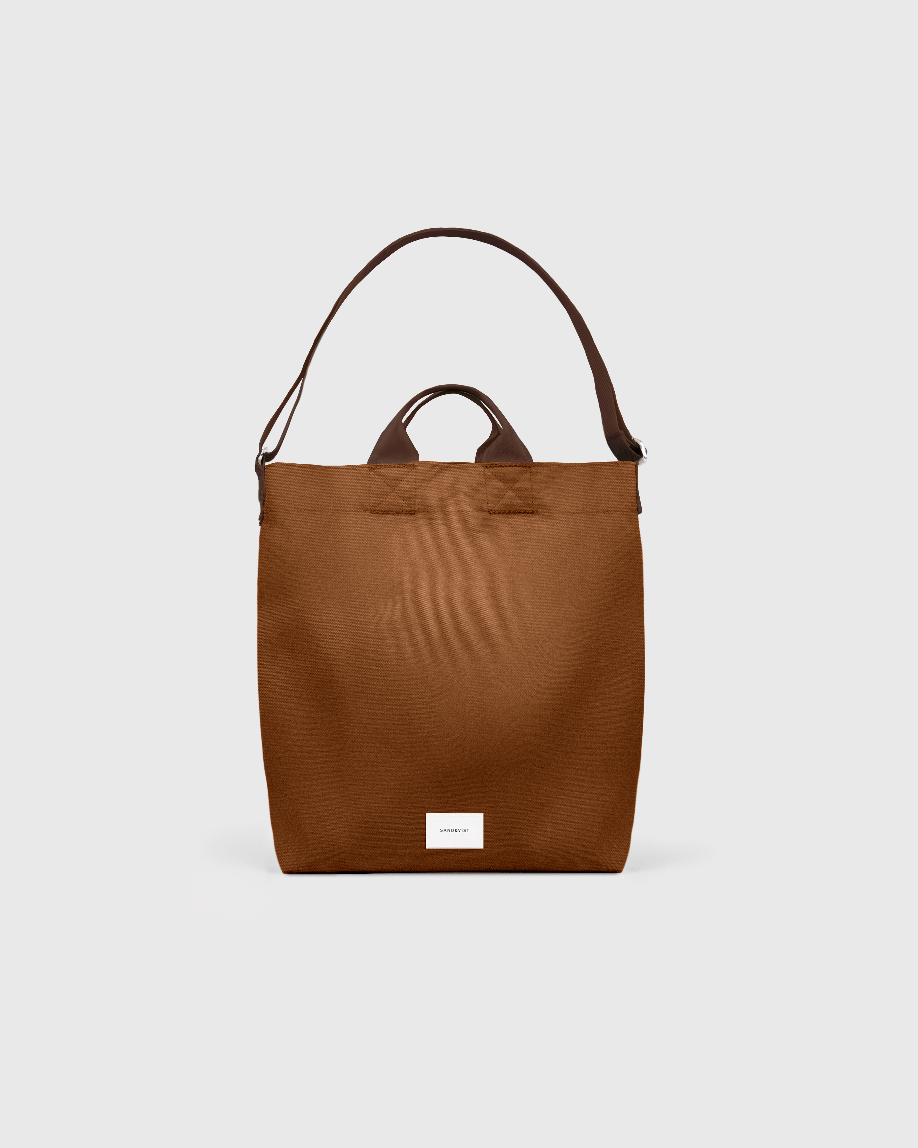 Sandqvist Ground Shopper Bag, brown. Front view, handles and shoulder strap.