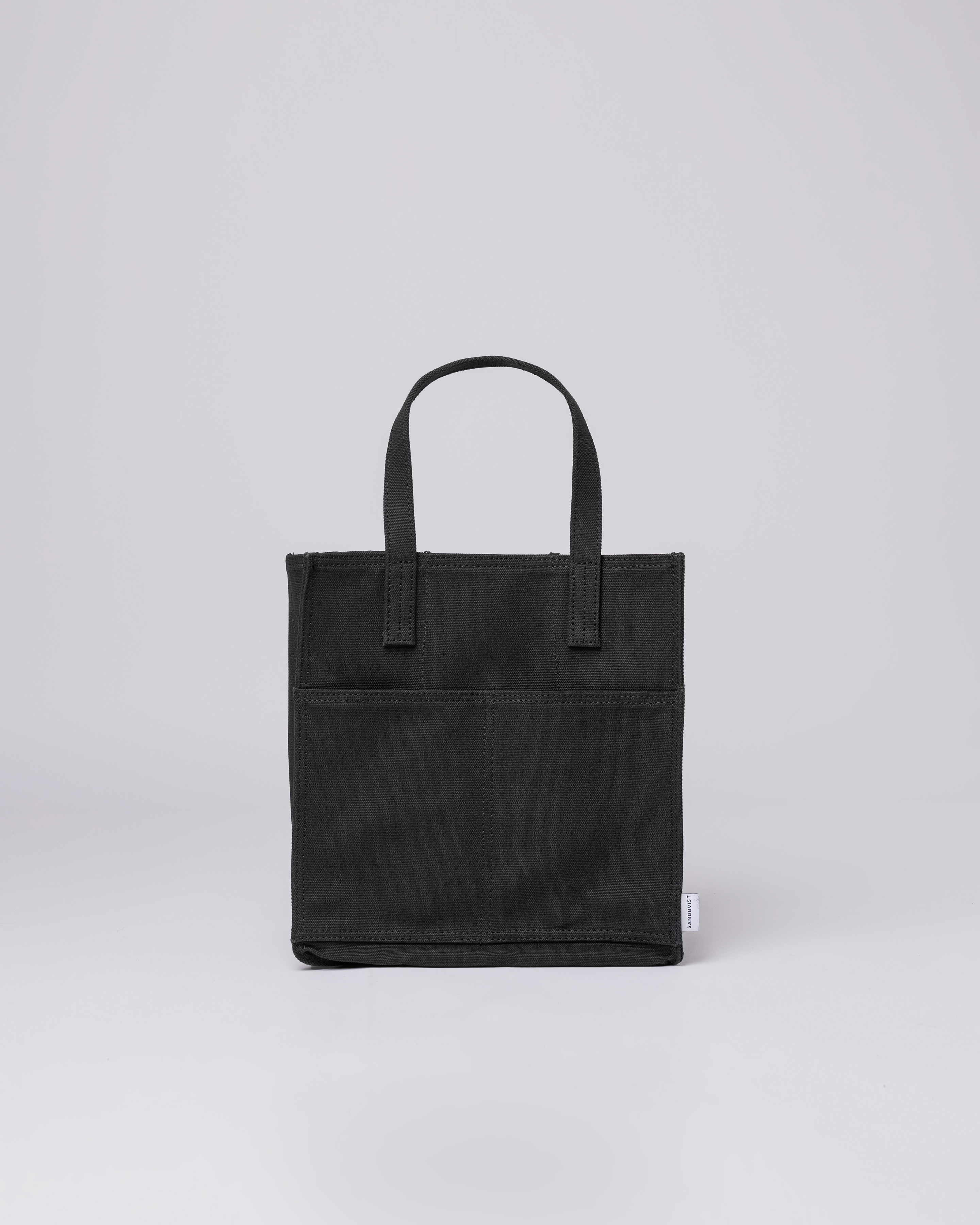 Sandqvist Bottle Bag in Black, front view with top handles and front slip pocket. 