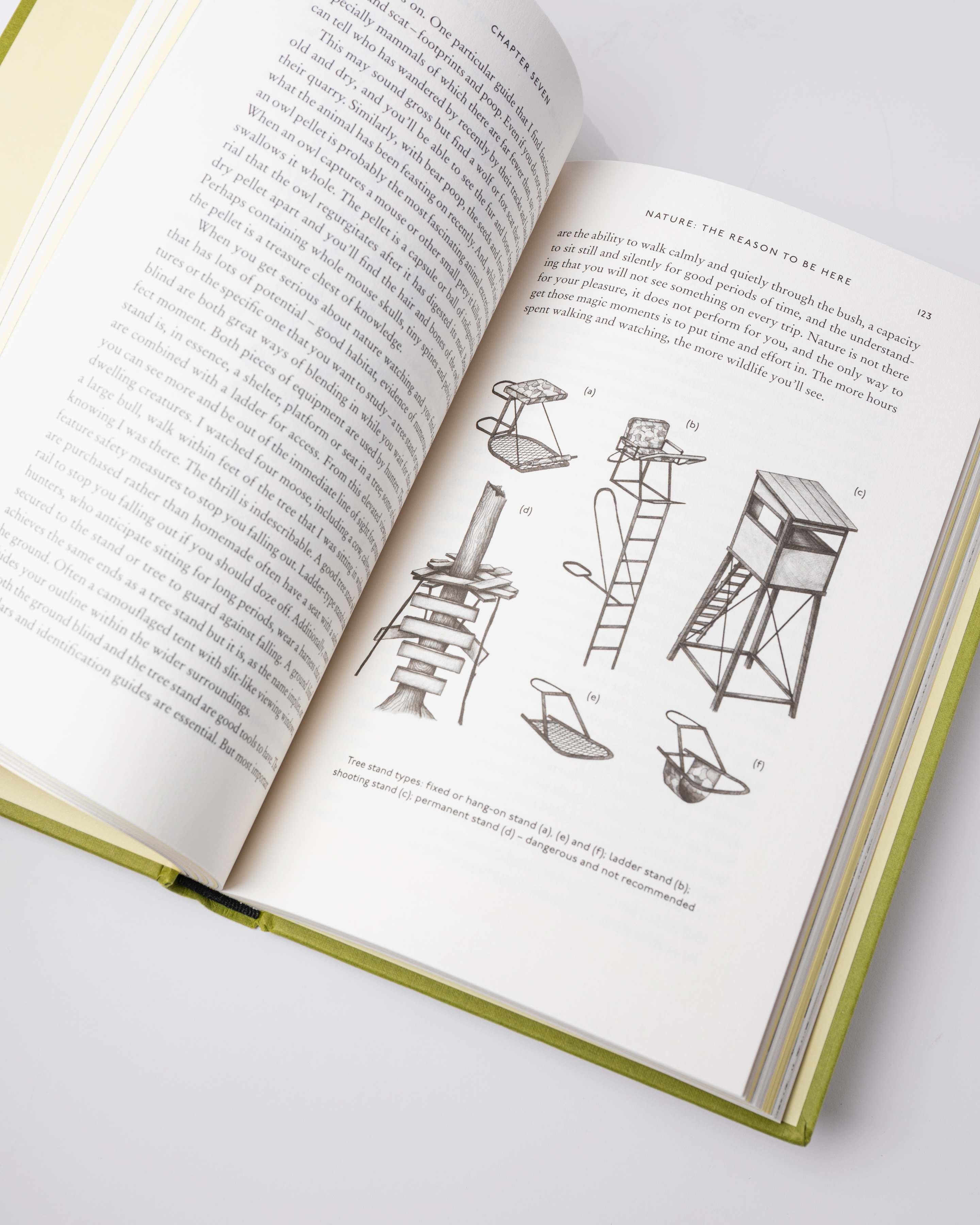 Opened book. Top view of two pages with text from the book Sandqvist Cabin.