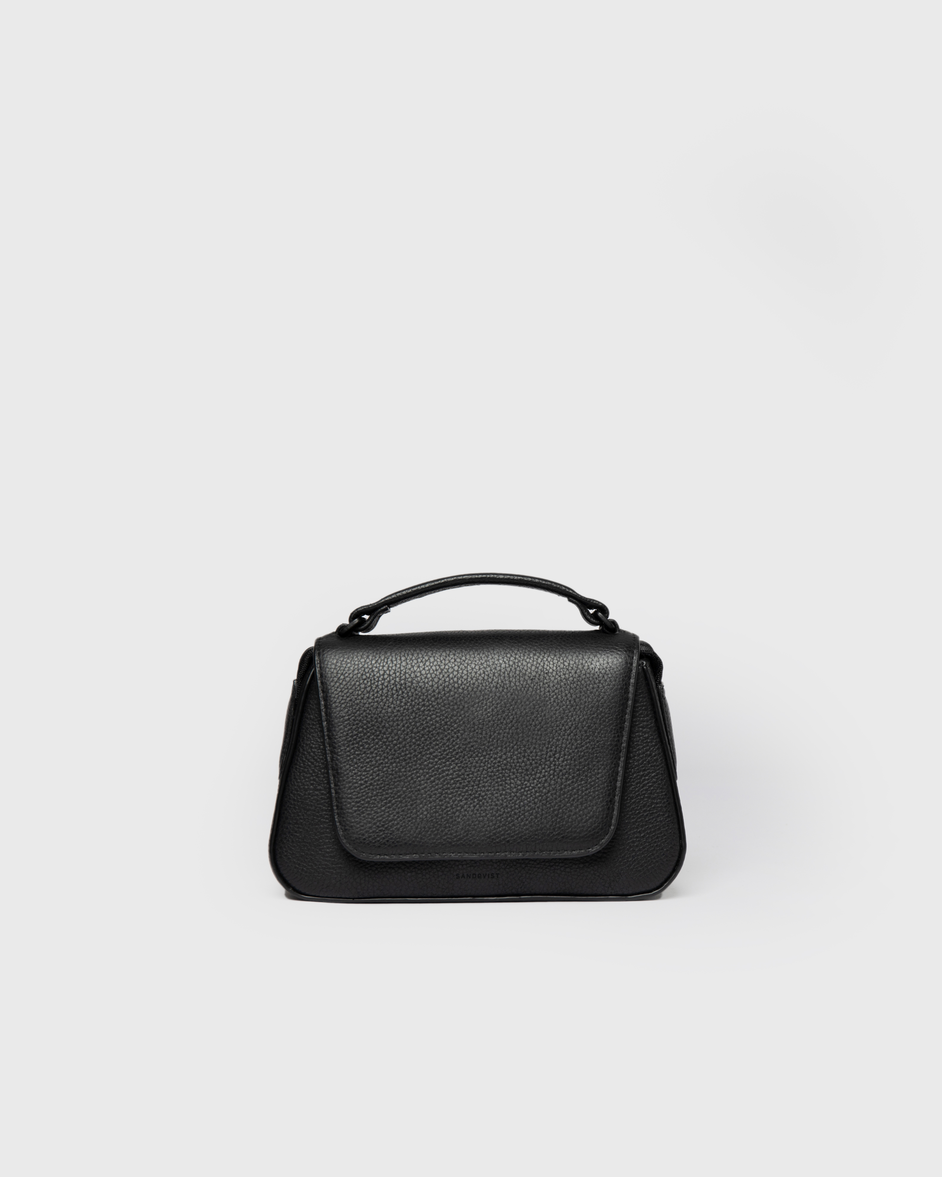 Front view of the Sandqvist Agile Handle Crossbody Bag, black.