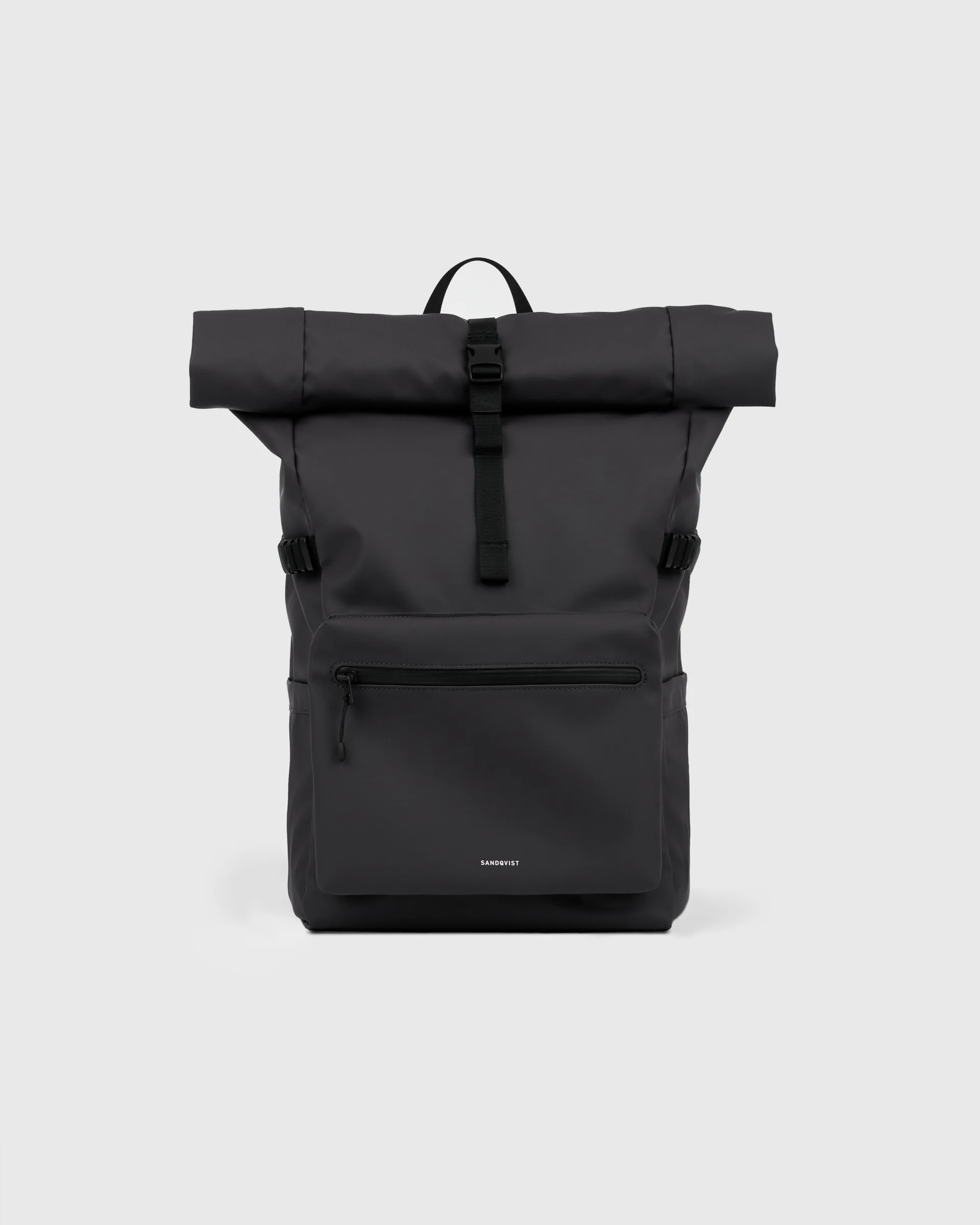 Sandqvist STREAM Rolltop backpack L in black, front view with zipper pocket, top handle, side straps and rolltop closure.