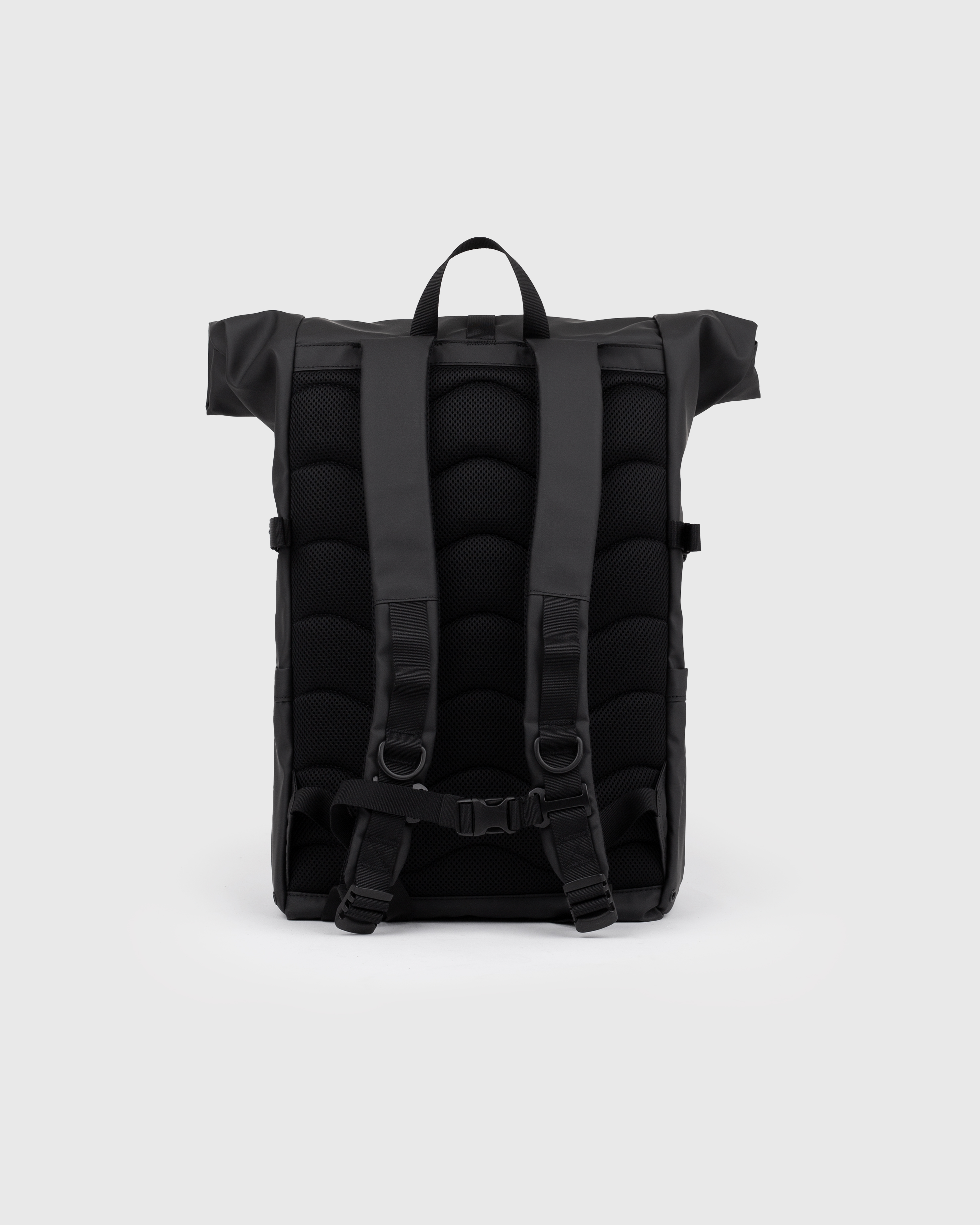 Backpack. Sandqvist STREAM Rolltop Backpack L in black, back view with padded back panel shoulder straps and rolltop closure.