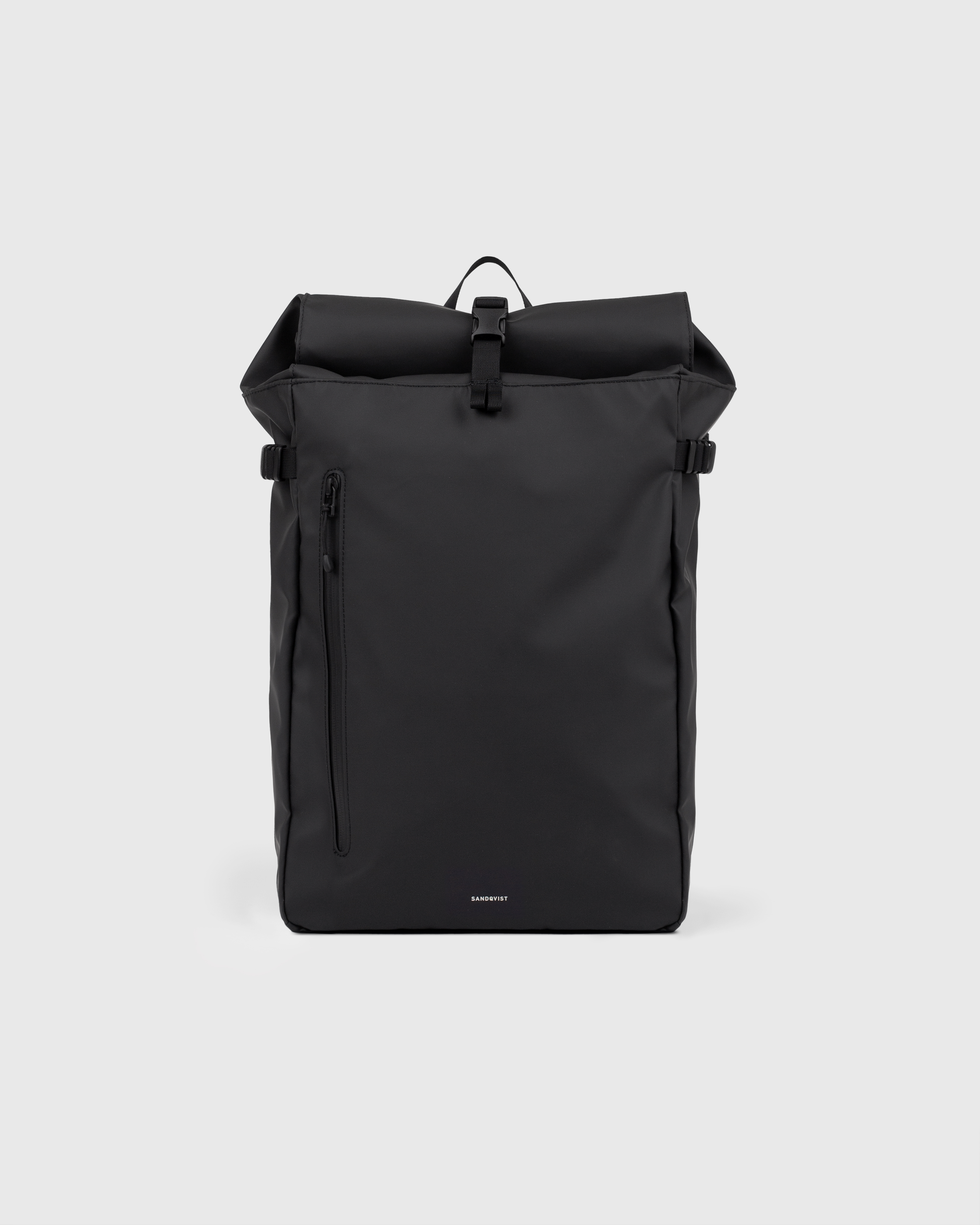 Sandqvist STREAM Slim Rolltop L backpack in black, front view with zipper pocket, top handle, side straps and rolltop closure.