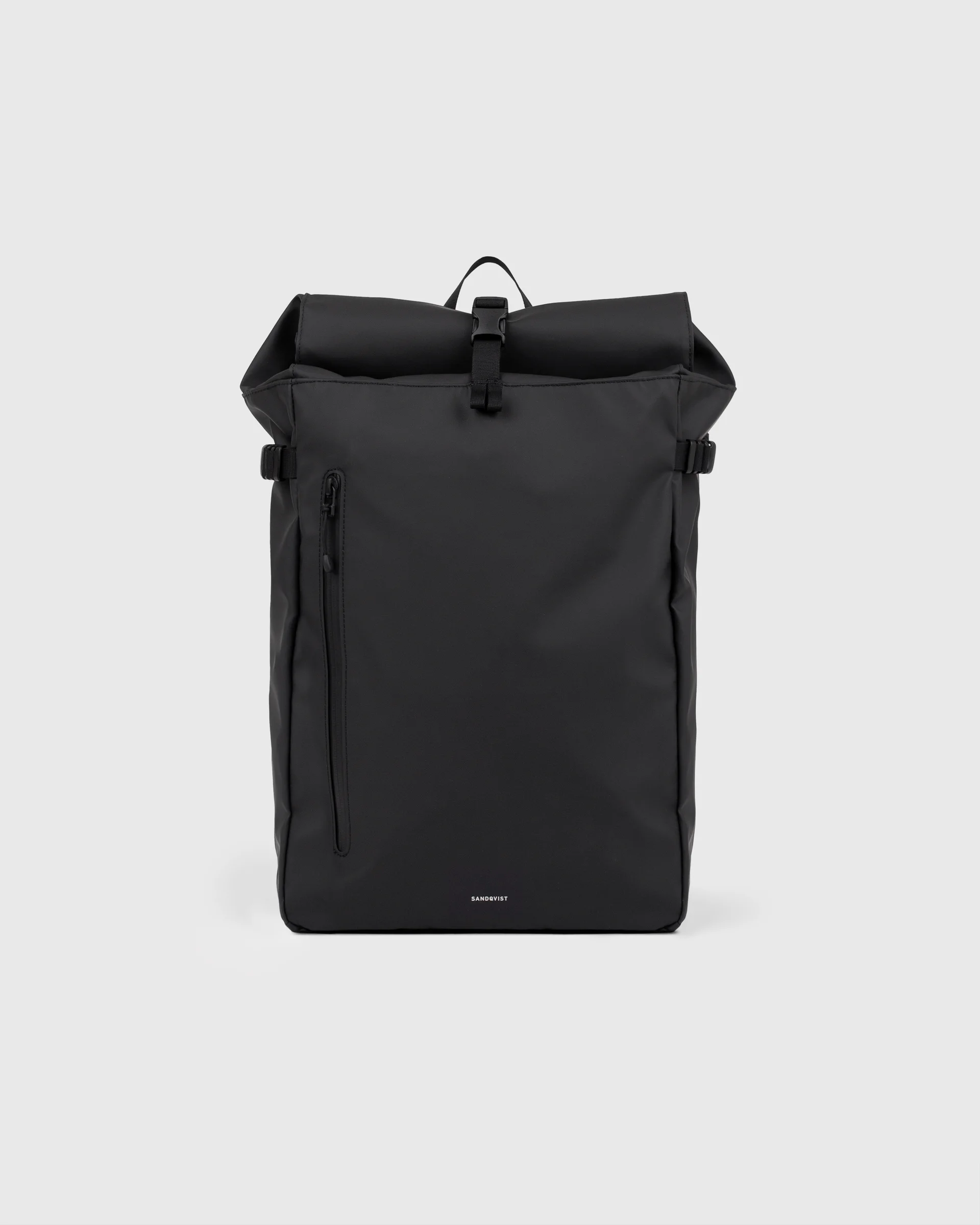 Sandqvist STREAM Slim Rolltop L backpack in black, front view with zipper pocket, top handle, side straps and rolltop closure.