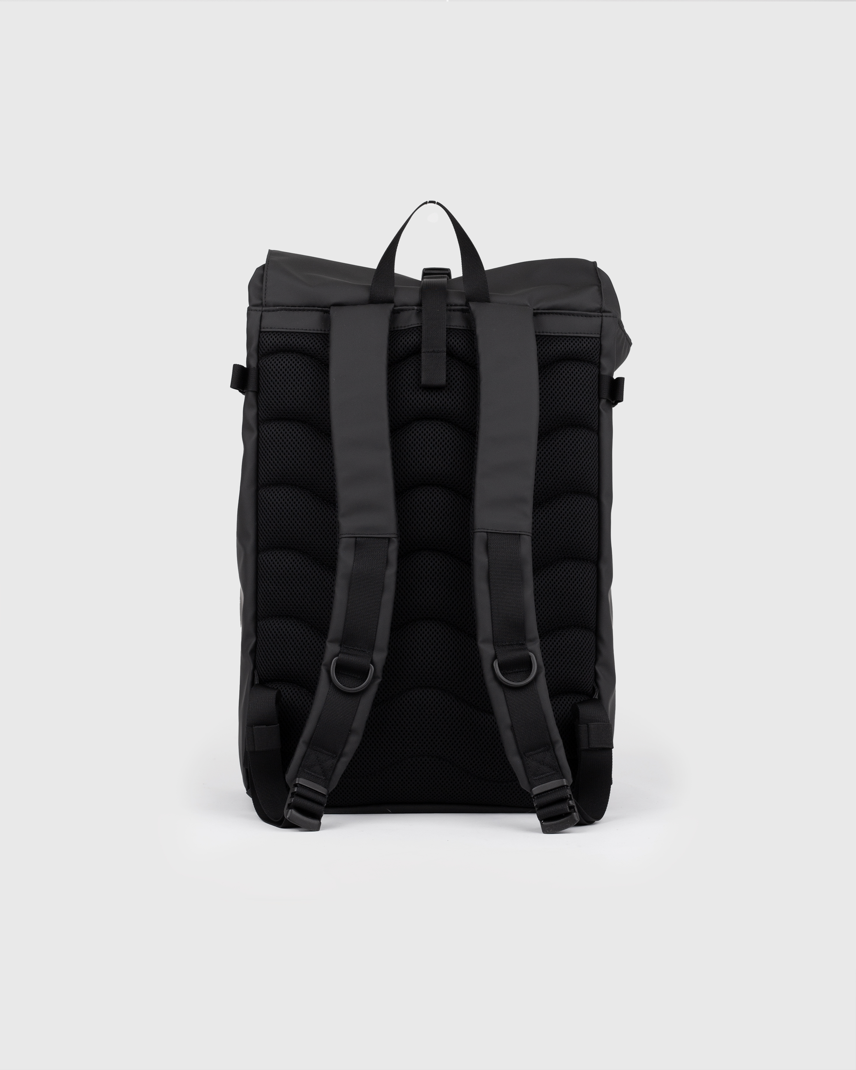 Sandqvist STREAM Slim Rolltop L backpack in black, back view with shoulder straps and roll-top closure.