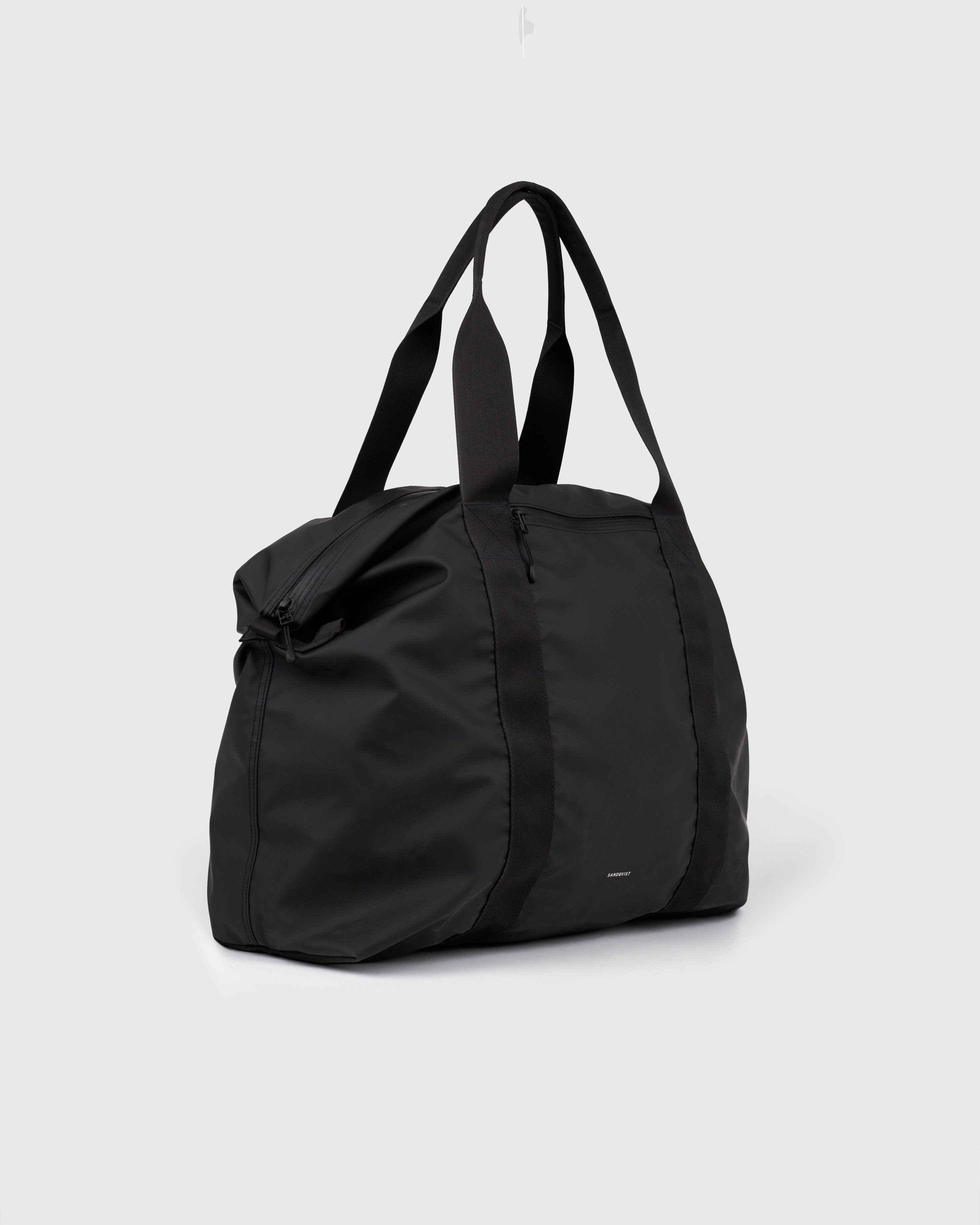 Sandqvist STREAM Weekender Bag, black, side view with top handles.
