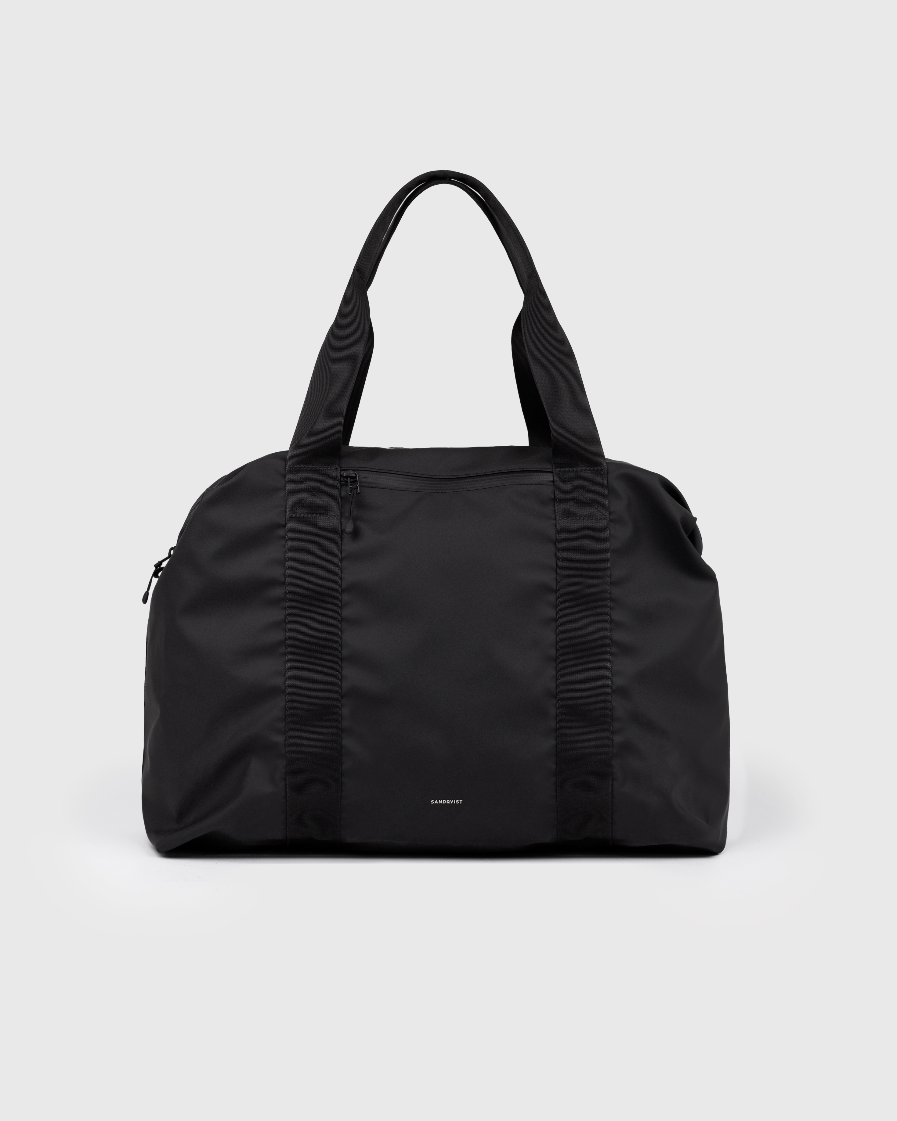 Sandqvist STREAM Weekender Bag, black, back view with top handles and zipper pocket and side buttons closed.