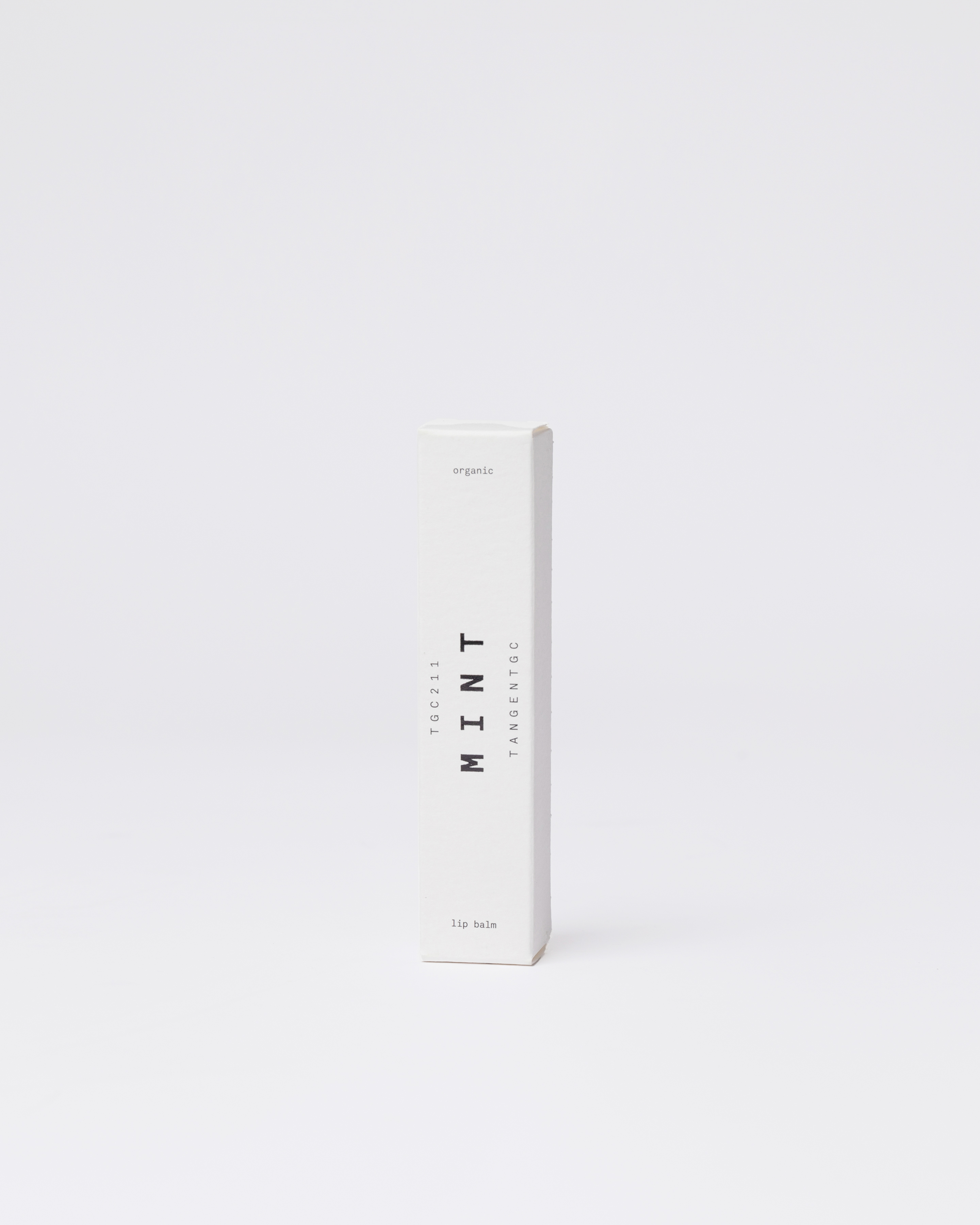 White cardboard box with black text Mint lip balm. Fromt view showing Sandqvist Mint Lip Balm. 
