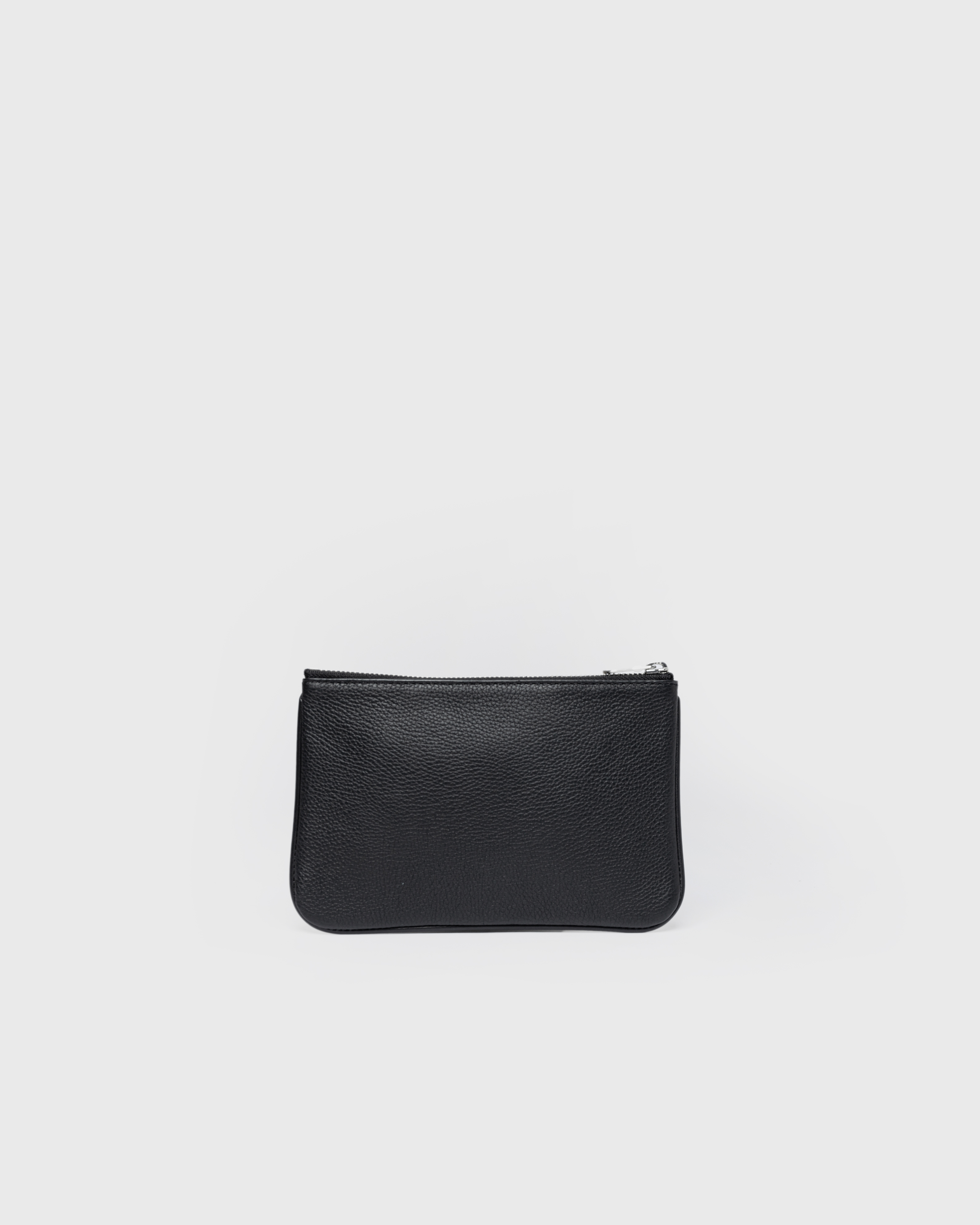 Back view of the Sandqvist LEATHER Pouch in black with zippered main compartment.
