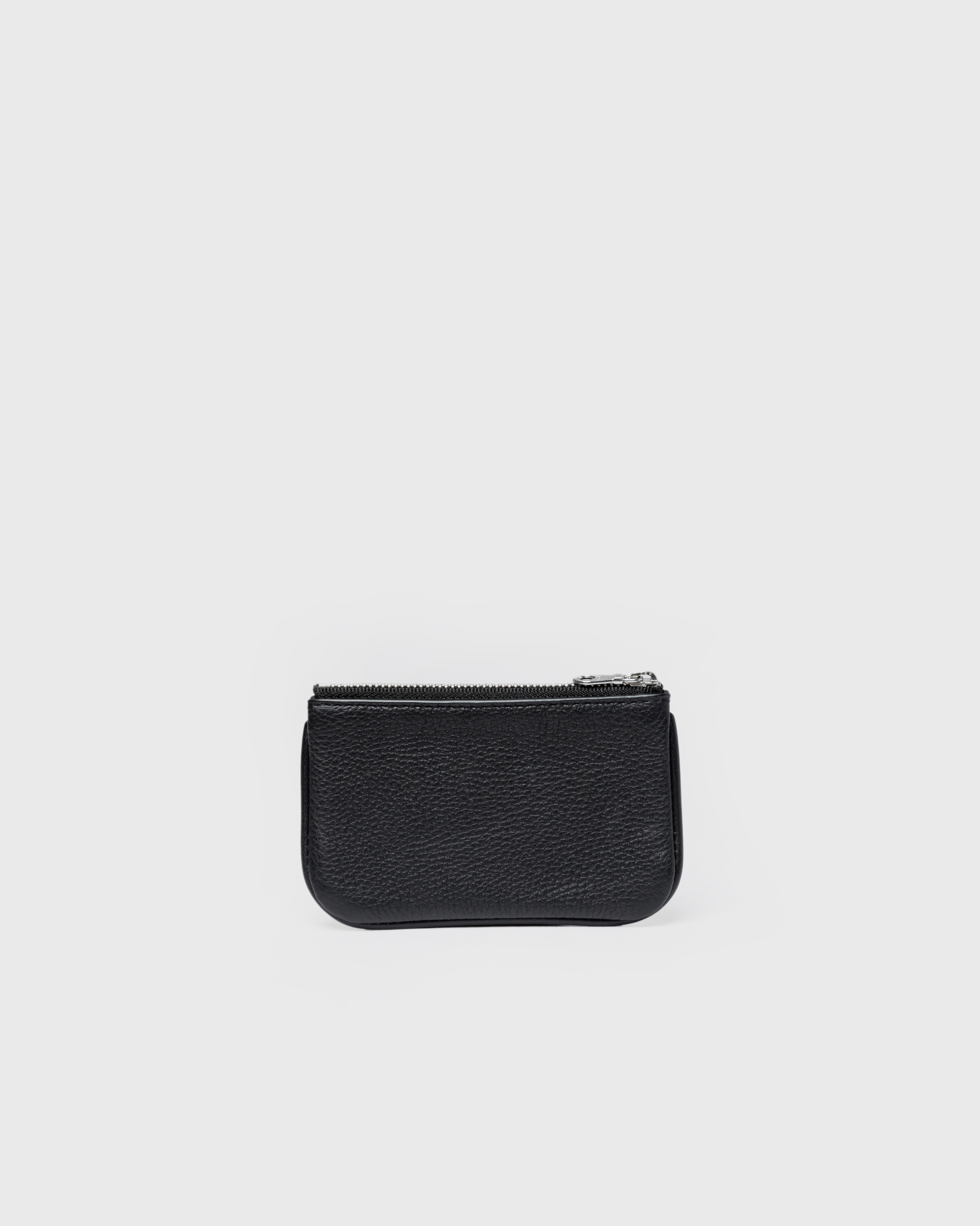 Back view of the wallet LEATHER Zip Wallet in black with zippered main compartment.