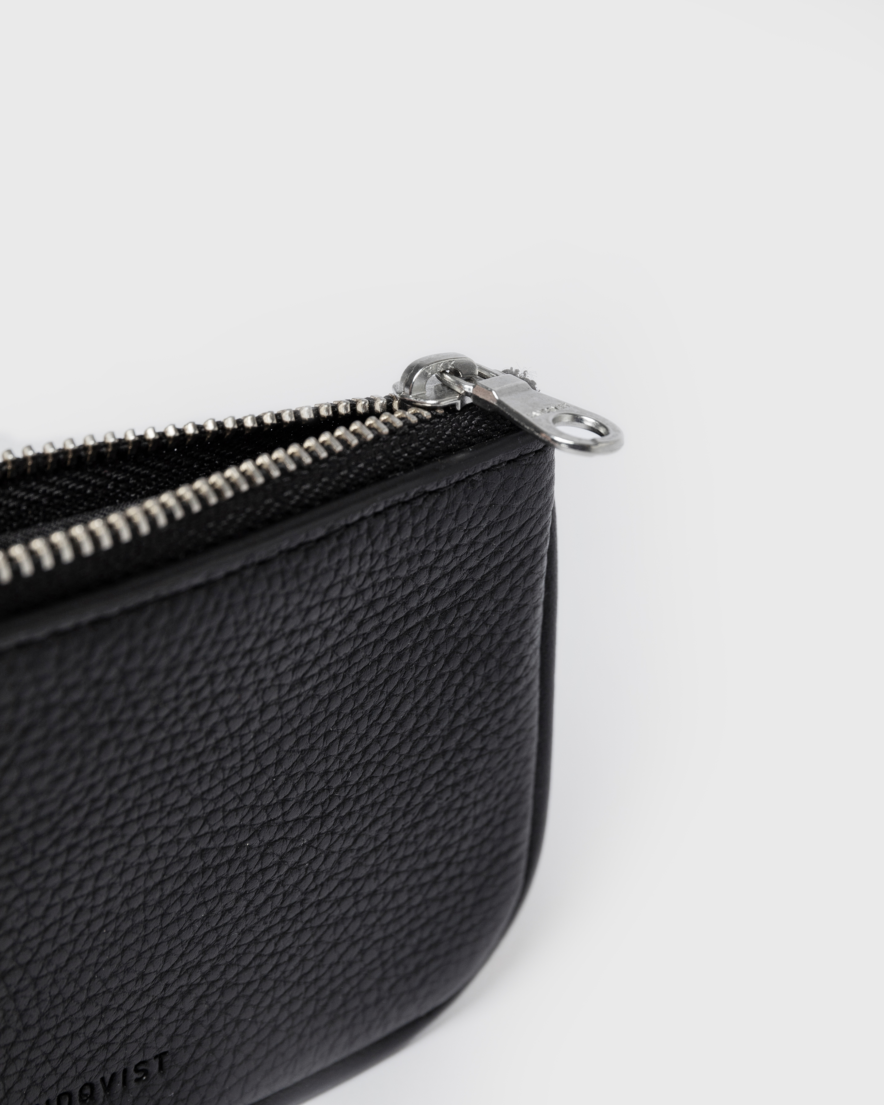 Close up view with opened zipper on main compartment on the wallet LEATHER Zip Wallet.