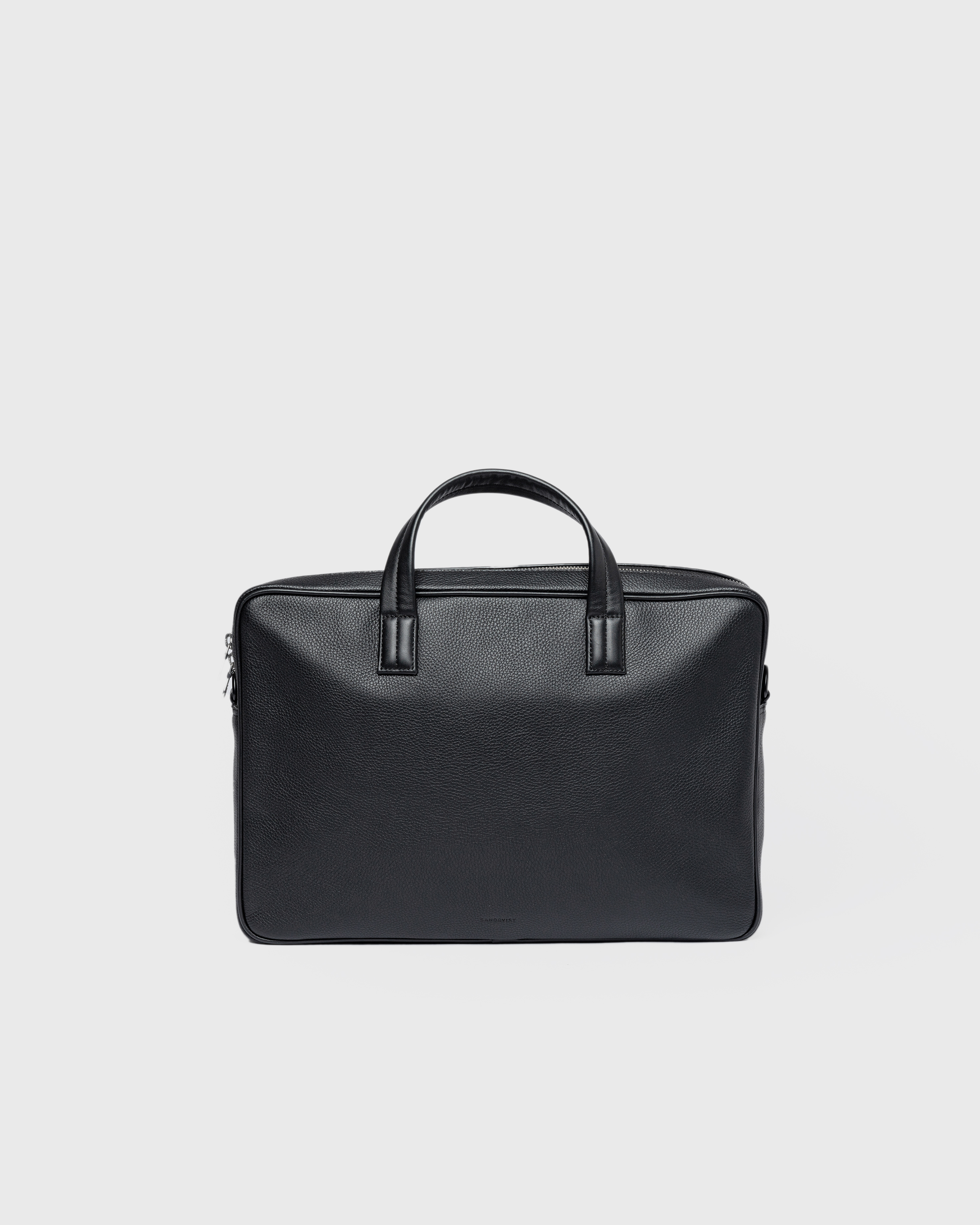 Sandqvist LEATHER Briefcase in black, front view with top handles and zipper closure..