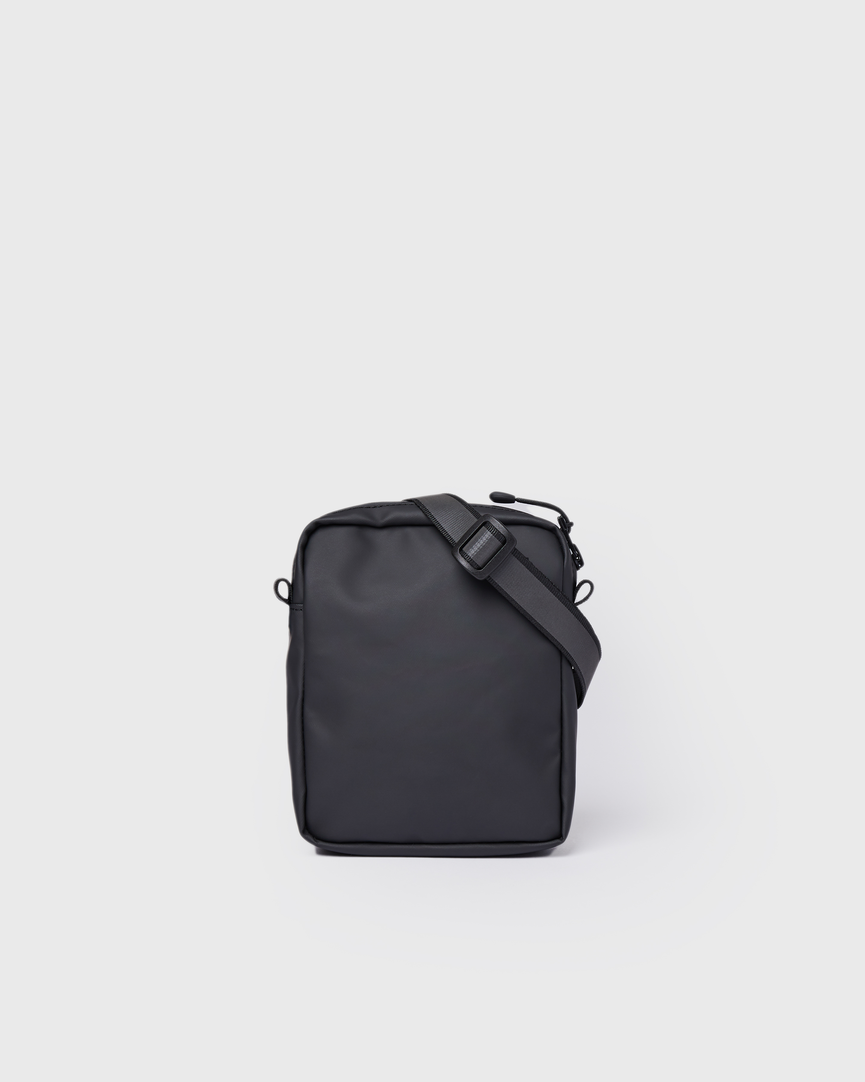 Sandqvist Shoulder Bag Poe in black, back view with adjustable shoulder strap.