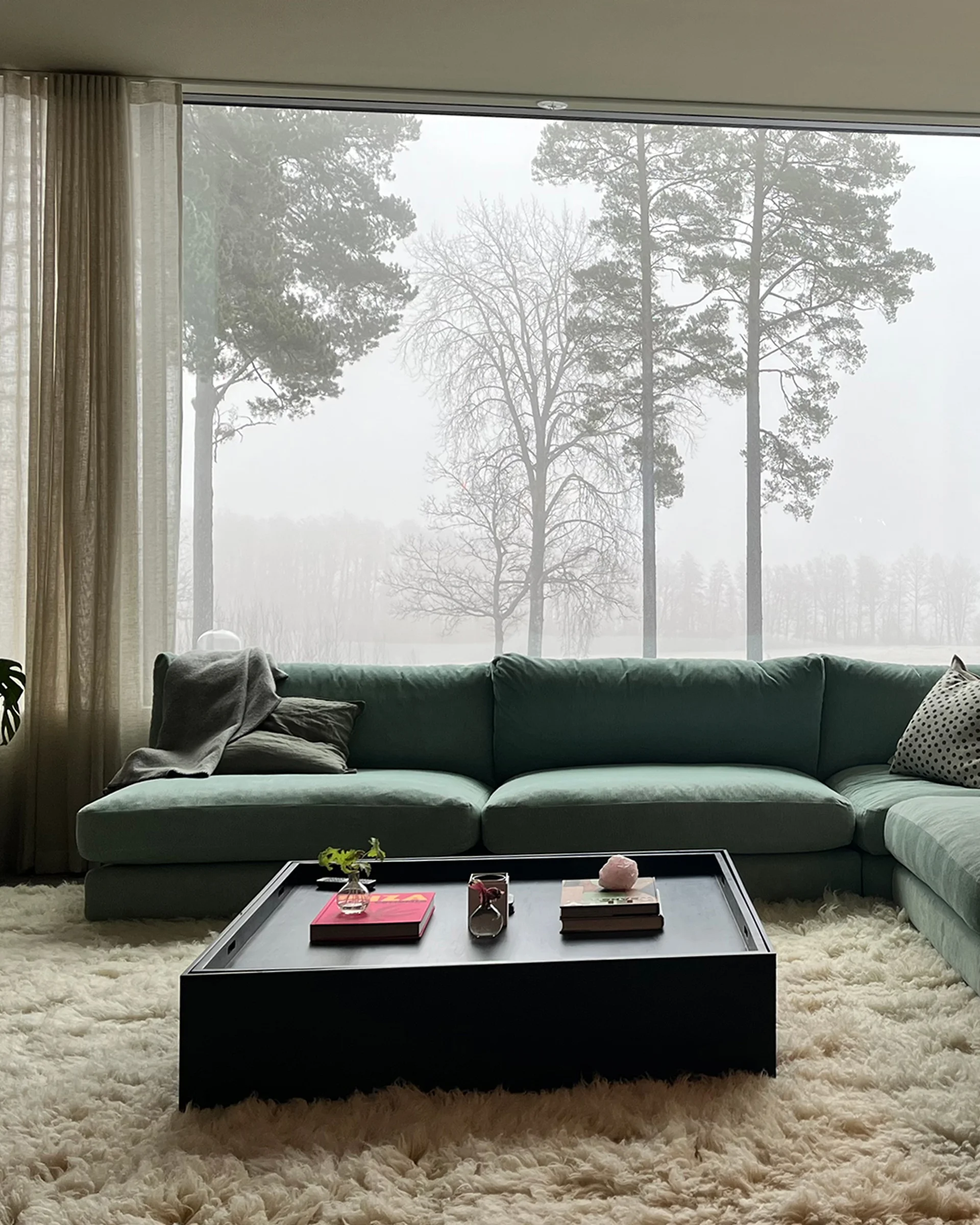 Mammuten modulsoffa hörnsoffa i grön sammet.