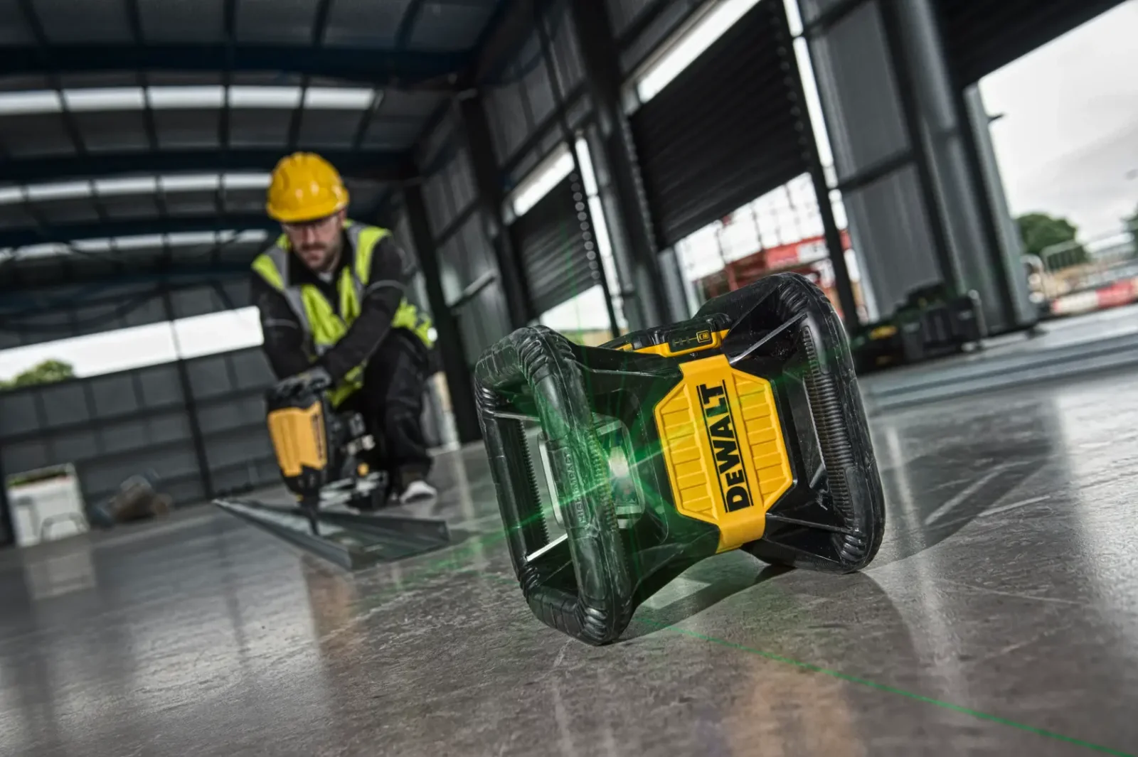 DeWalt DCE079 rotary laser in use on site