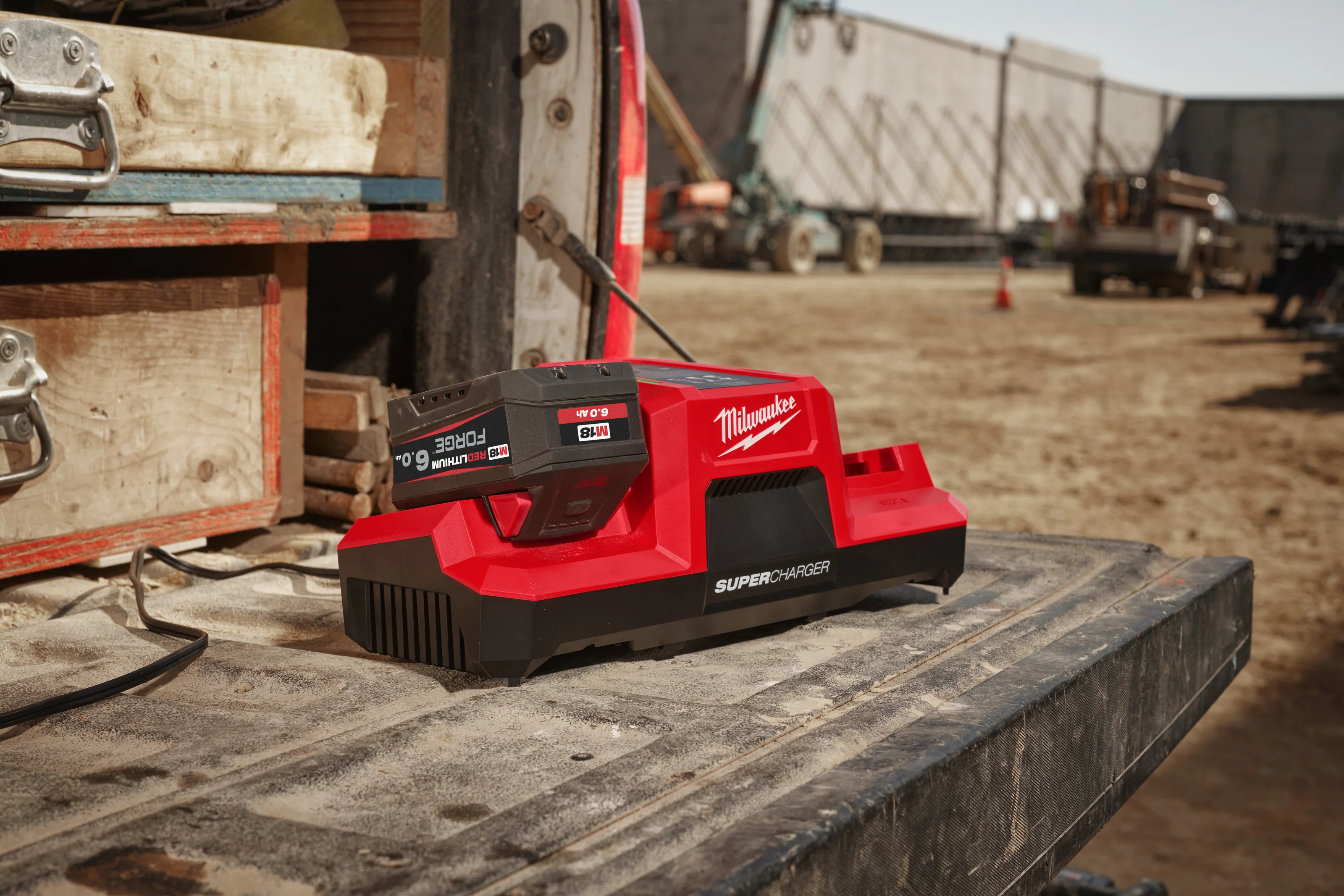 M18 DBSC Dual Bay Super Charger in use on the job