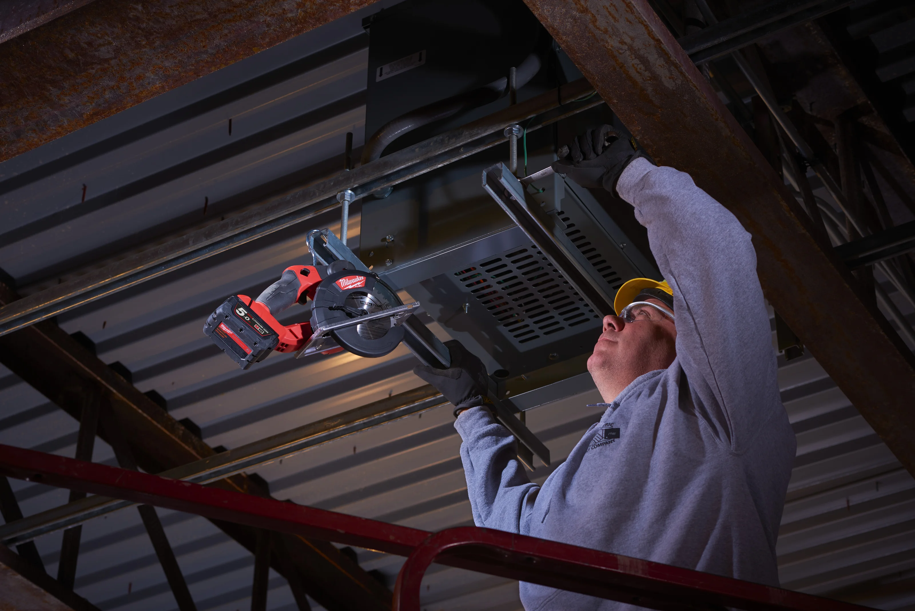 M18 FMCS FUEL Metal Circular Saw in use on the job