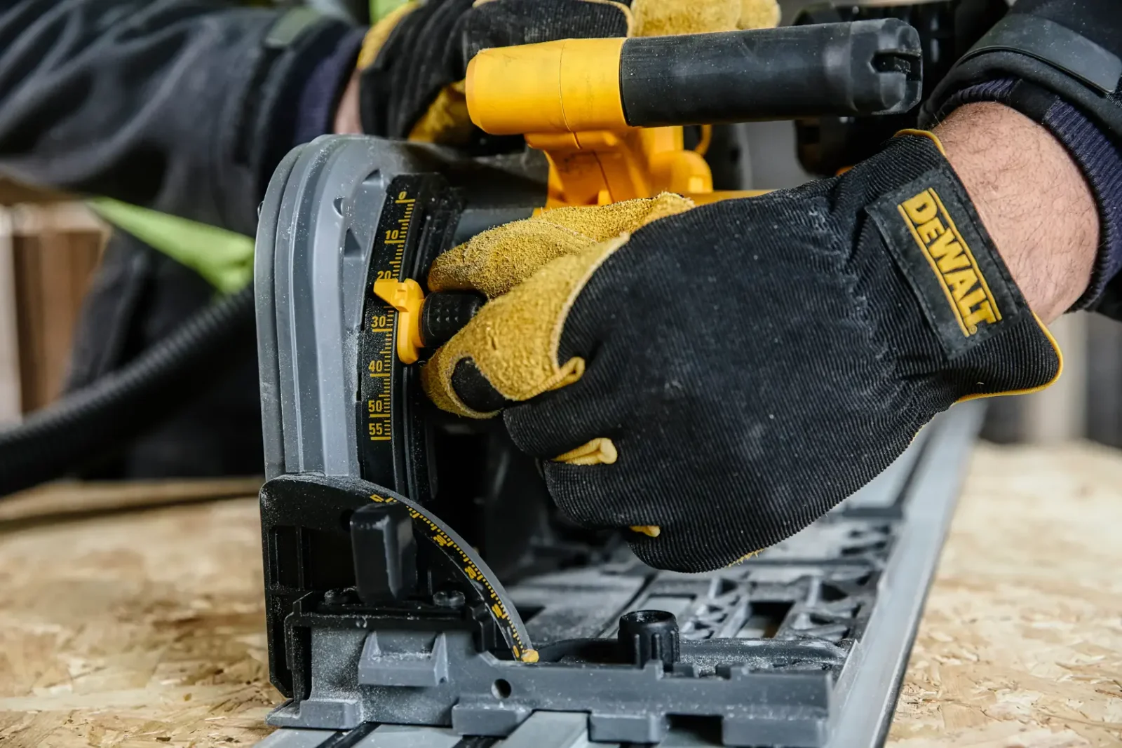 DeWalt DCS520 plunge saw in use on site
