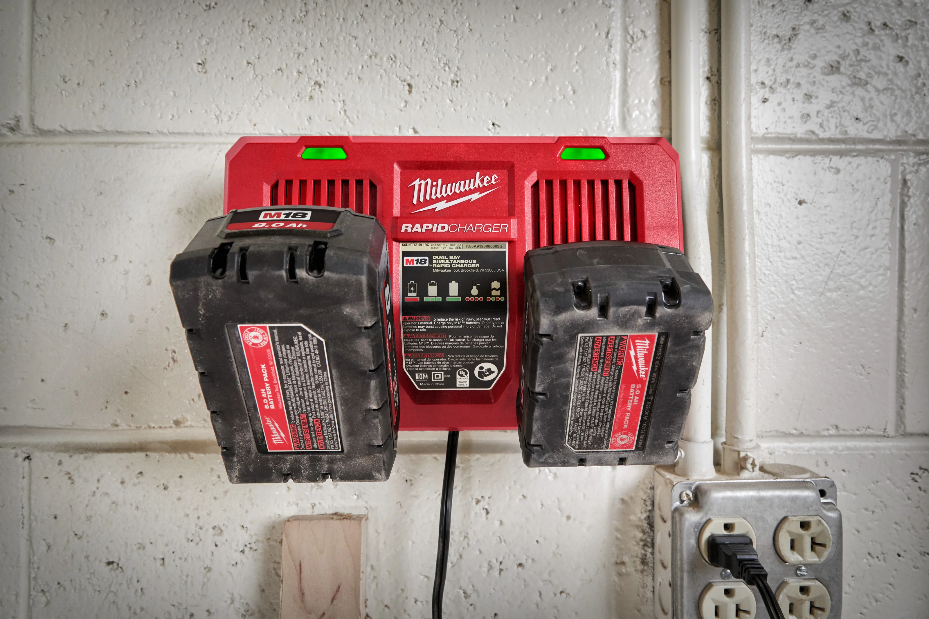 M18 DFC Dual Bay Rapid Charger in use on the job