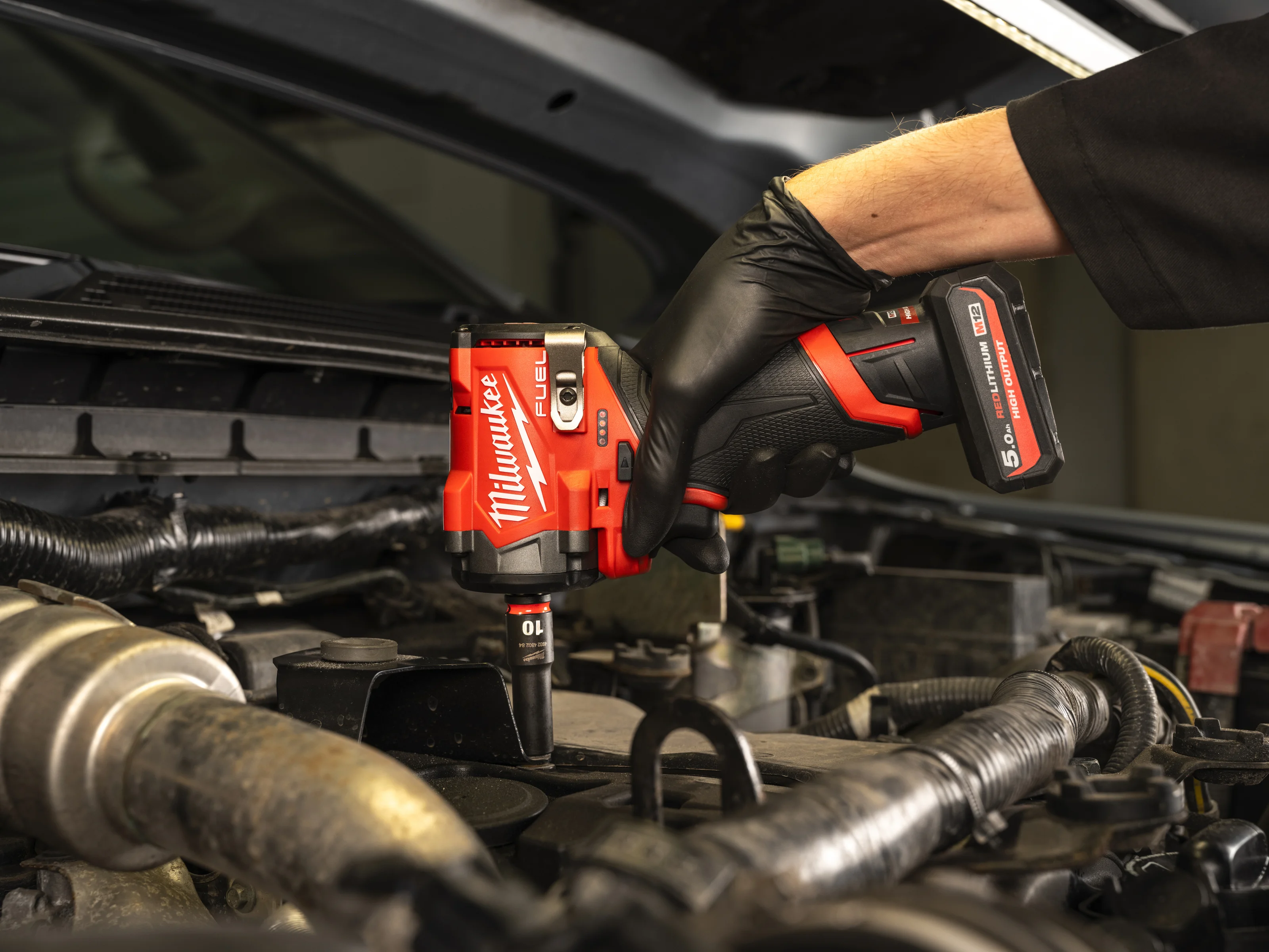 M12 FCIWF12G3 FUEL Compact Impact Wrench in use on the job