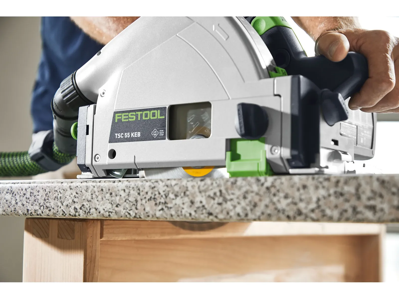 TSC 55 K cutting a stone worktop edge