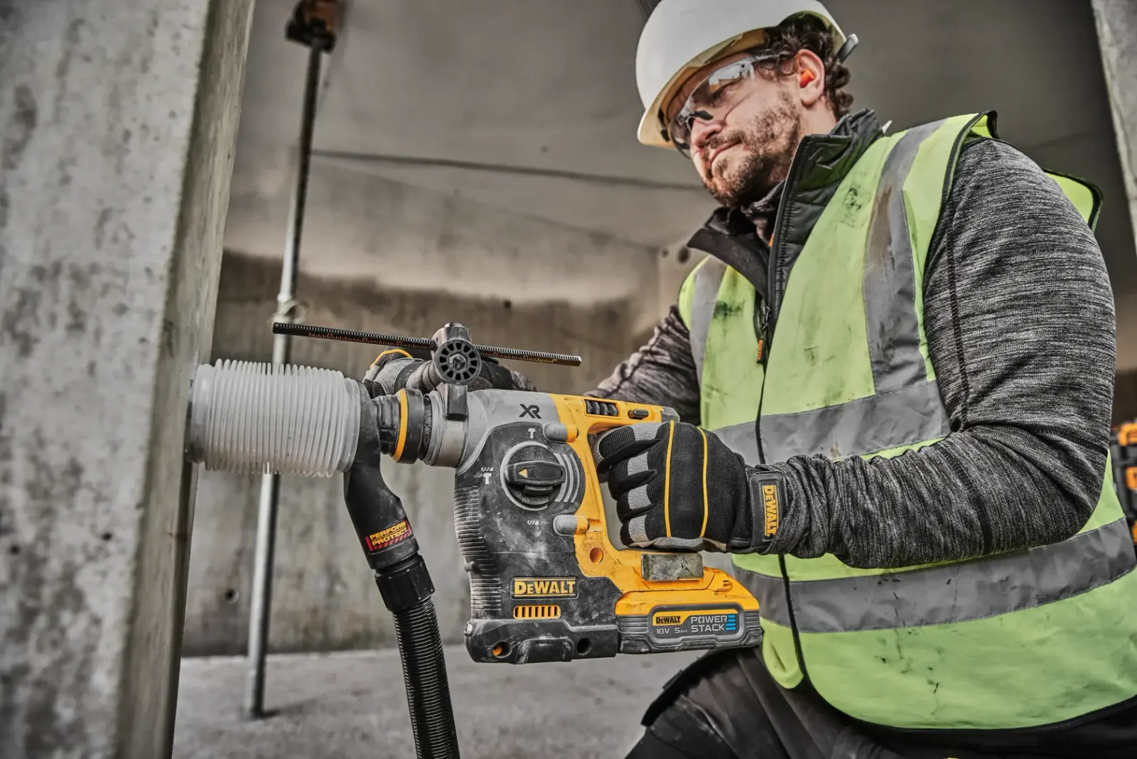 DeWalt DCH273 SDS-plus hammer drill in use on site